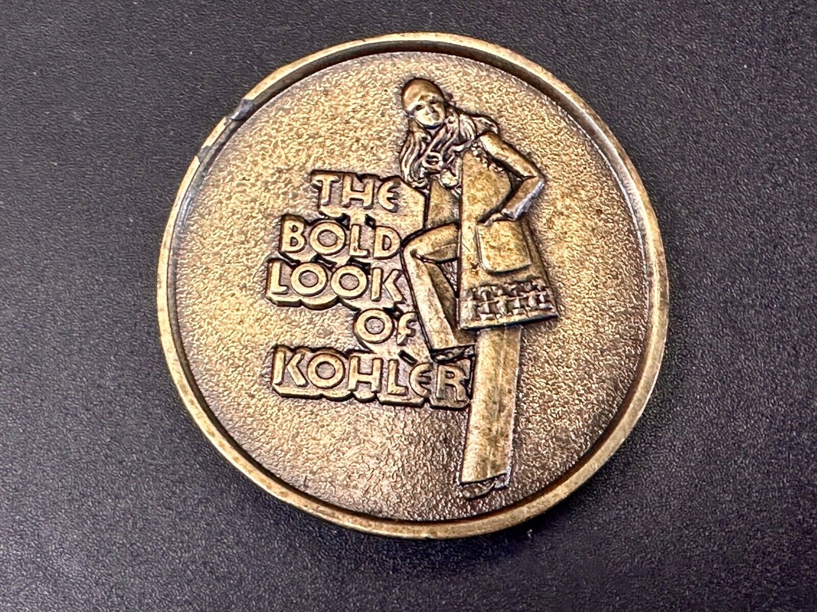 The Bold Look of Kohler Vintage 1977 Lewis round Limited Edition belt buckle