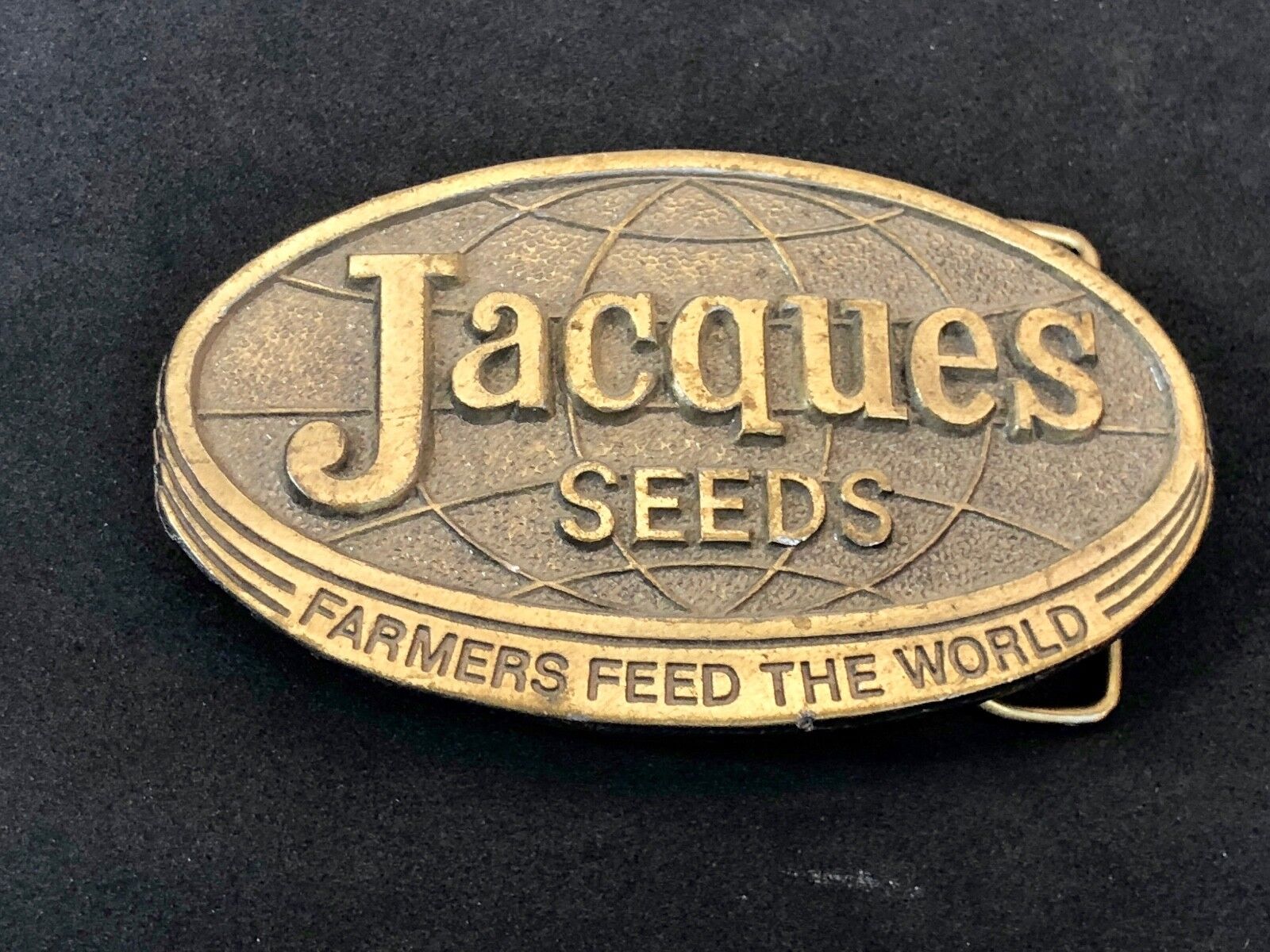 1970’s Jacques Seeds belt buckle    farmers feed the world.   Limited ED. Lewis 