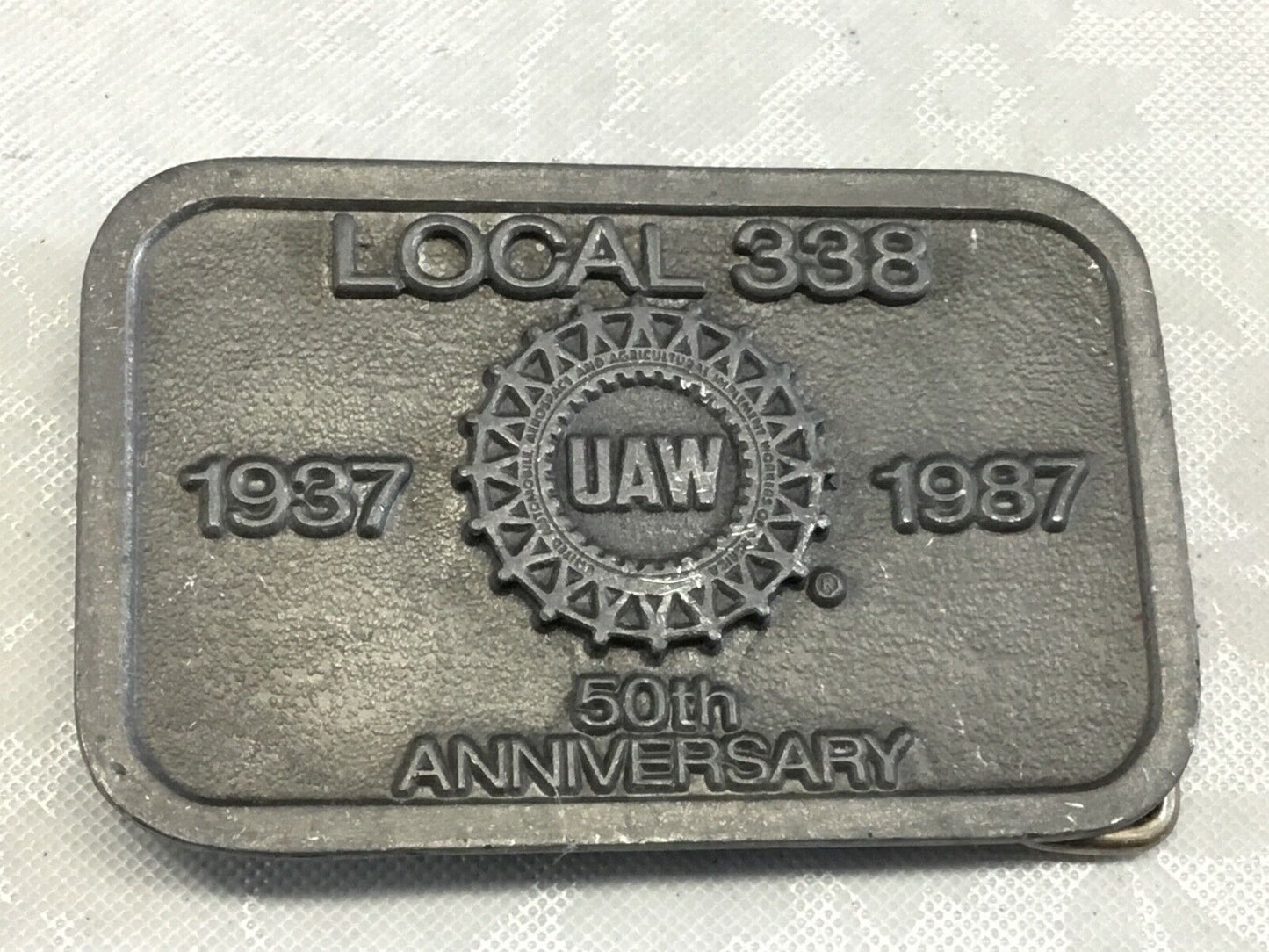 UAW Local 338 belt buckle      1987 -50th aniversery United Auto Workers  