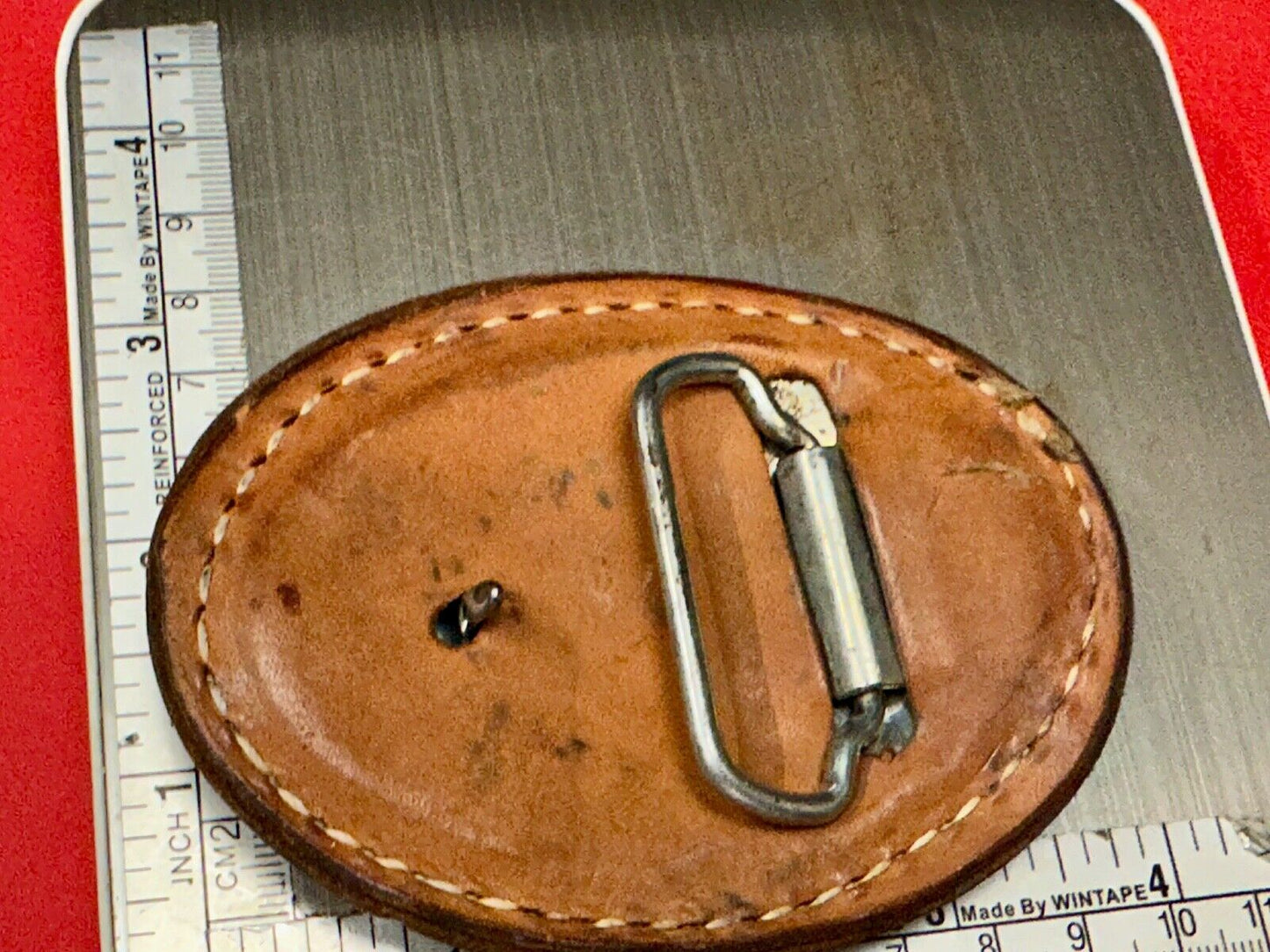 Unique leaf pattern in leather belt buckle made of Abalone shell