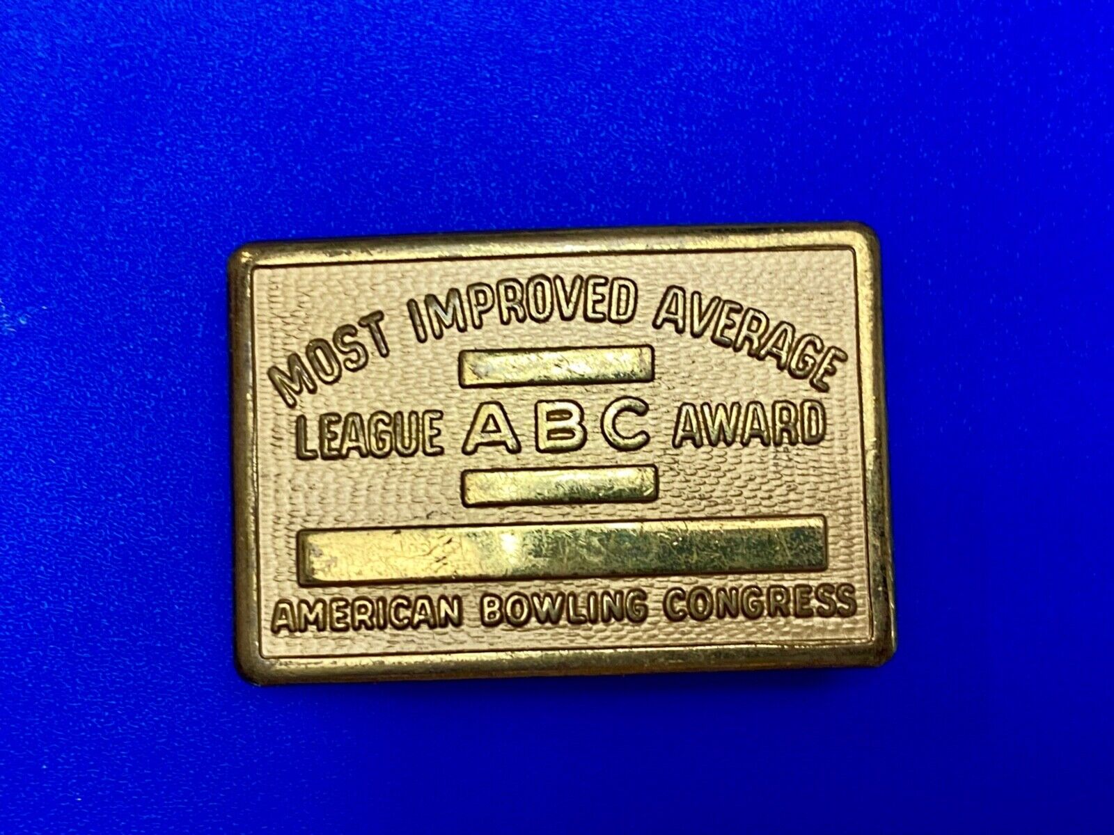 AMERICAN BOWLING CONGRESS MOST IMPROVED AVERAGE AWARD BELT BUCKLE BLANK RIBBON