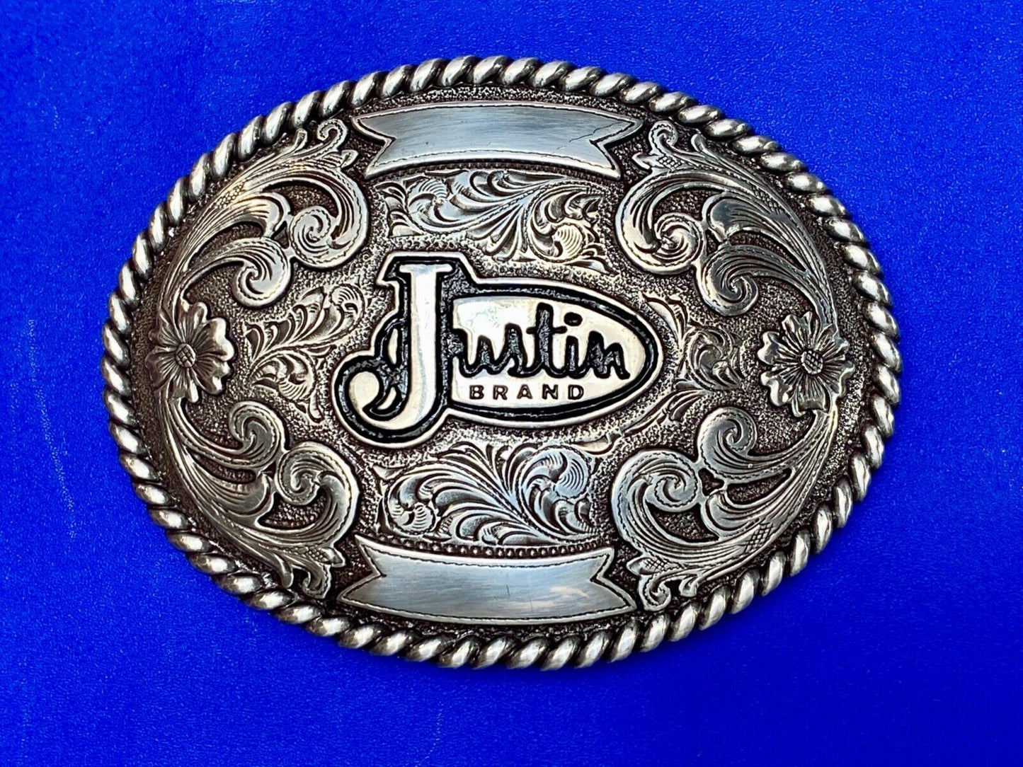 Vintage Justin Cowboys ornate flower swirl Belt Buckle with blank trophy scroll