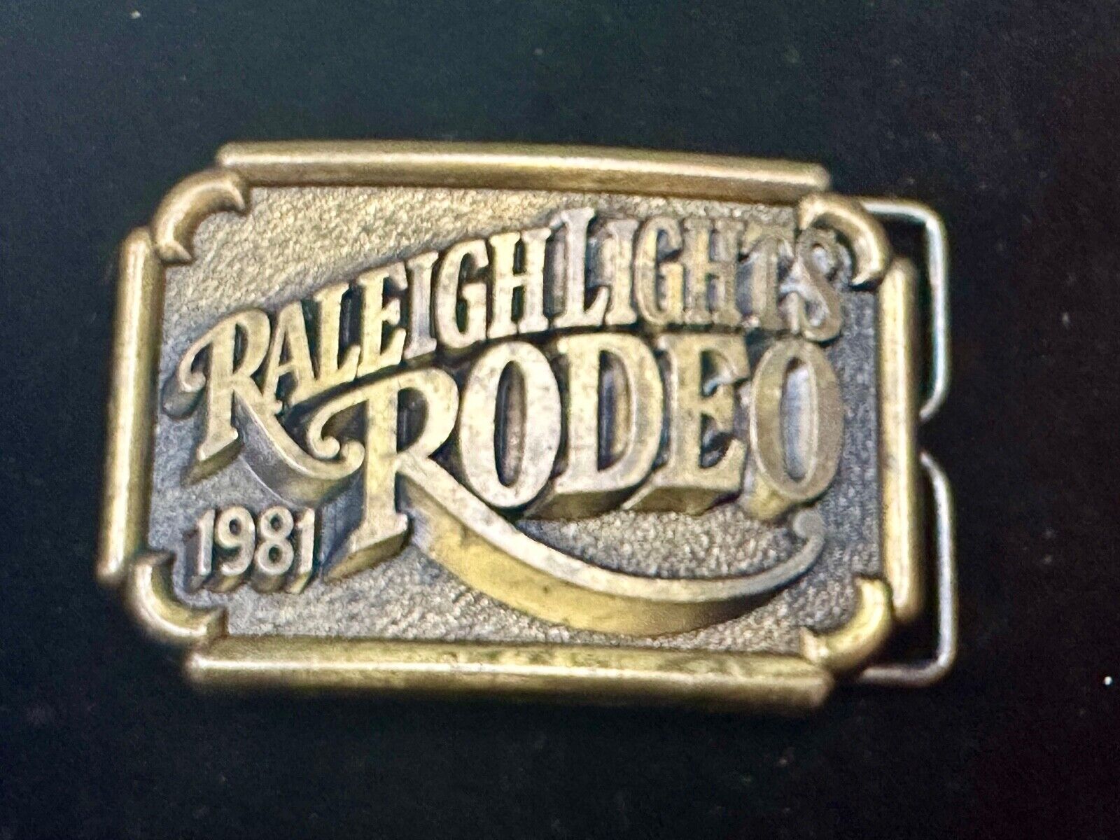 Vintage 1981 Raleigh Lights Rodeo Brass Tone Belt Buckle Advertising Cigarettes