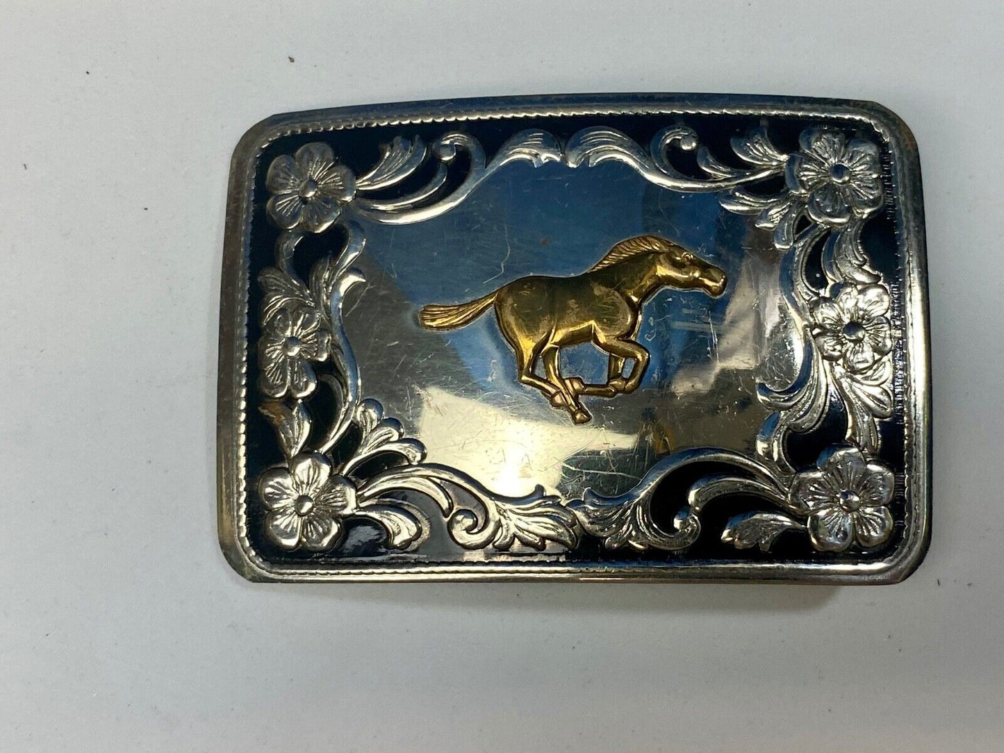 Antique Horse western Nickle Silver and black paint flower swirl belt buckle 
