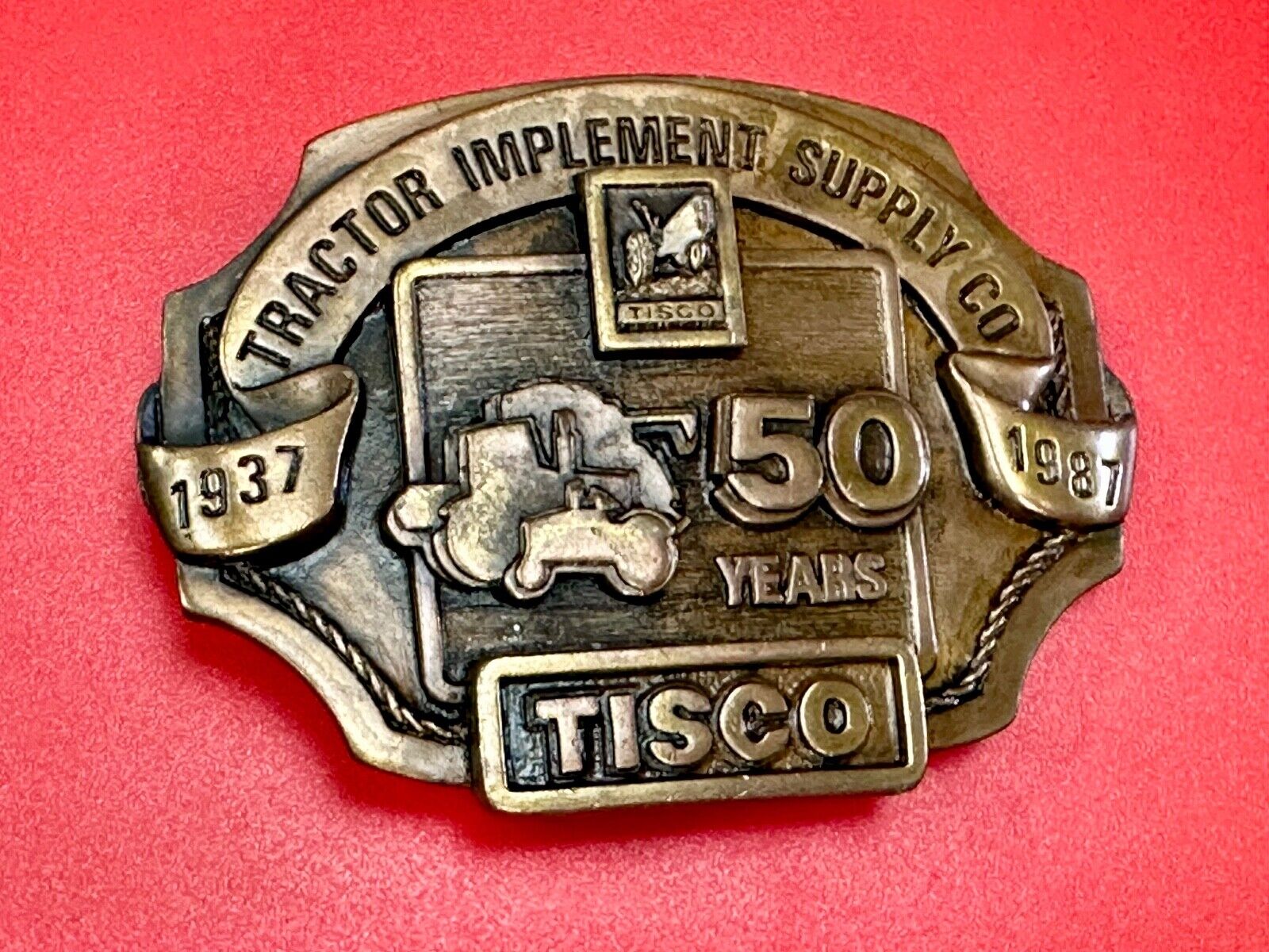 Tisco 50 year celebration Tractor farm supply company promo 1986 belt buckle