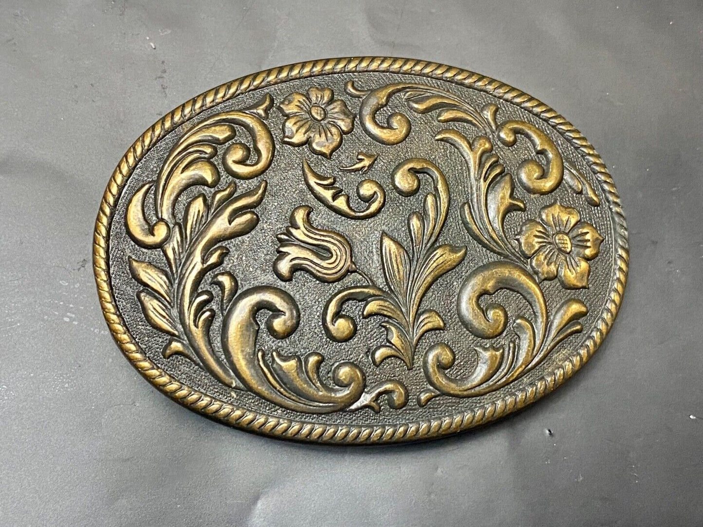 Vintage Dark Western flower swirl Oval Cowgirls belt buckle