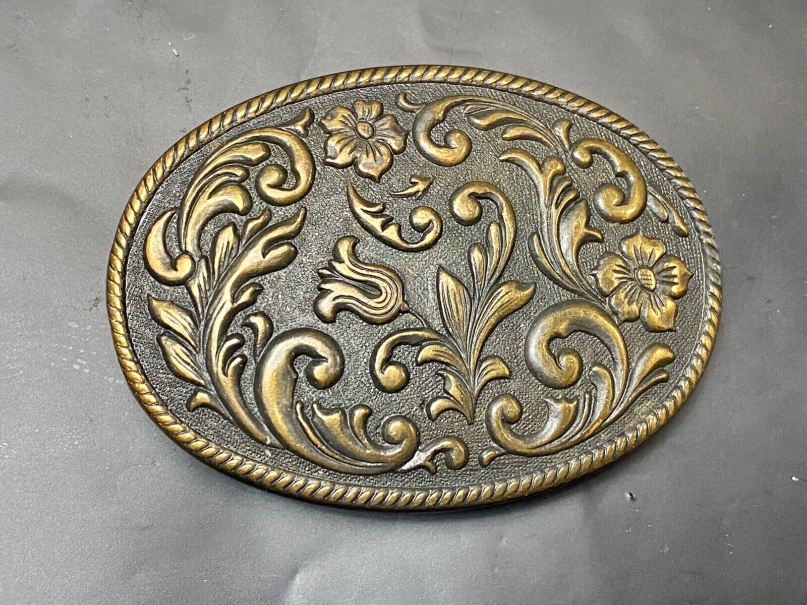 Vintage Dark Western flower swirl Oval Cowgirls belt buckle