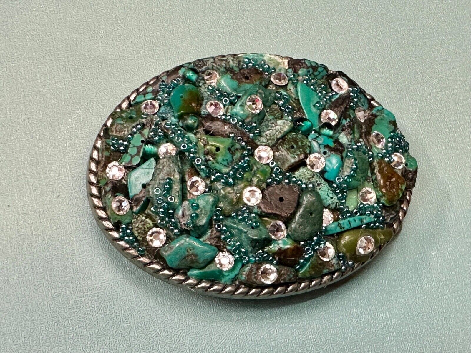 Artisan Chunky shades of Green and clear rhinestone mixed material belt buckle