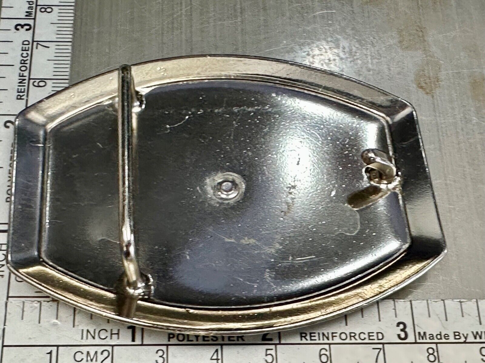 Vintage Horseback Riders cowboys belt buckle with black & white enamel accents