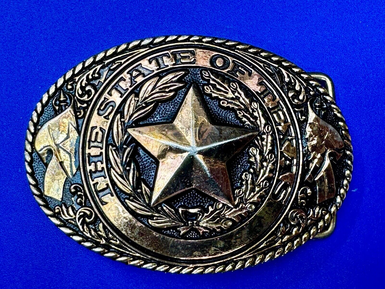 TEXAS State Pride - RAISED 3D STAR centered in brass tone oval Belt Buckle