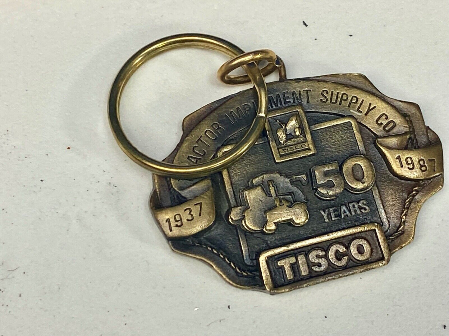TISCO Tractor Implement Supply Co 50 year celebration NOS Keychain 