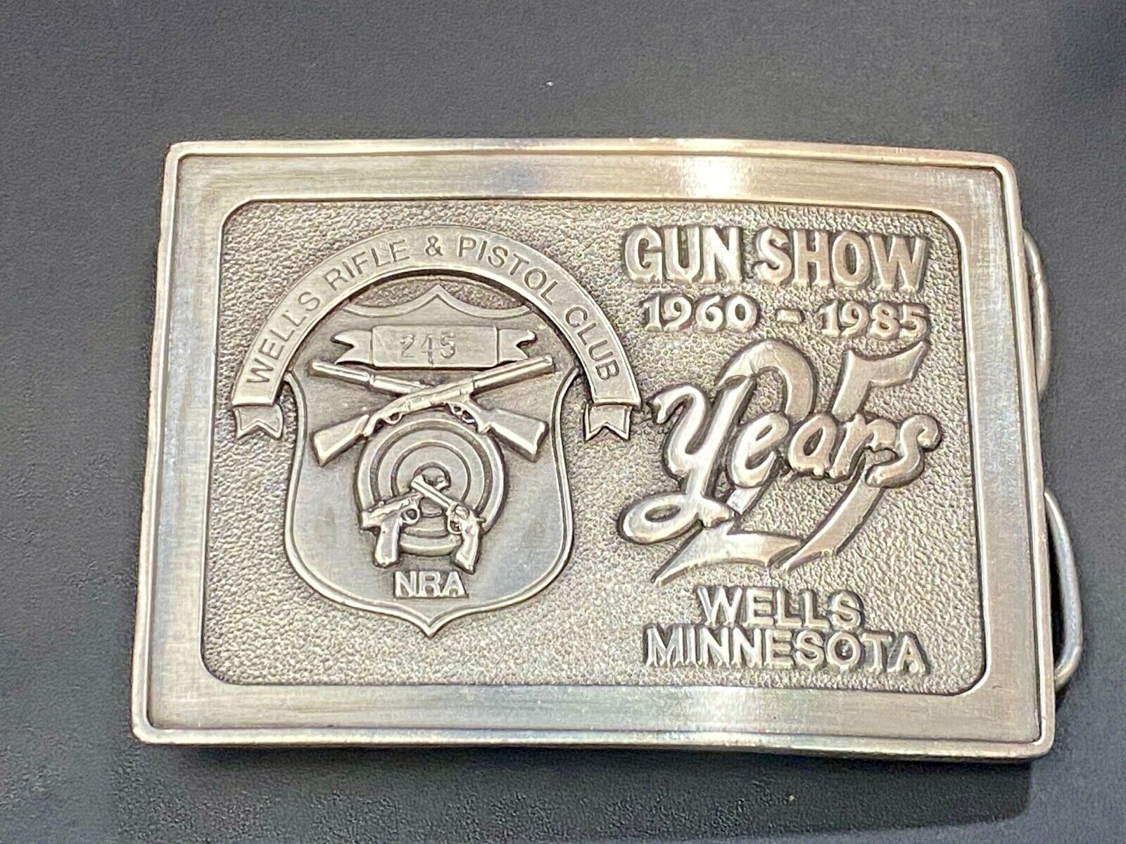 25 years, wells Montana gun show  hunters rifle and pistol club NRA belt buckle 