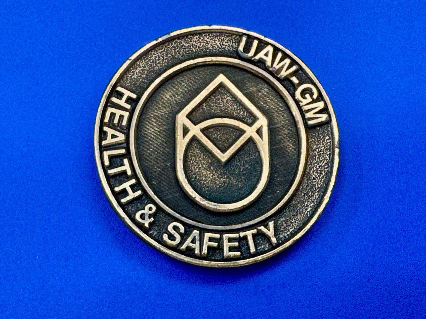 UAW-GM auto workers union round Health & Safety Award belt buckle