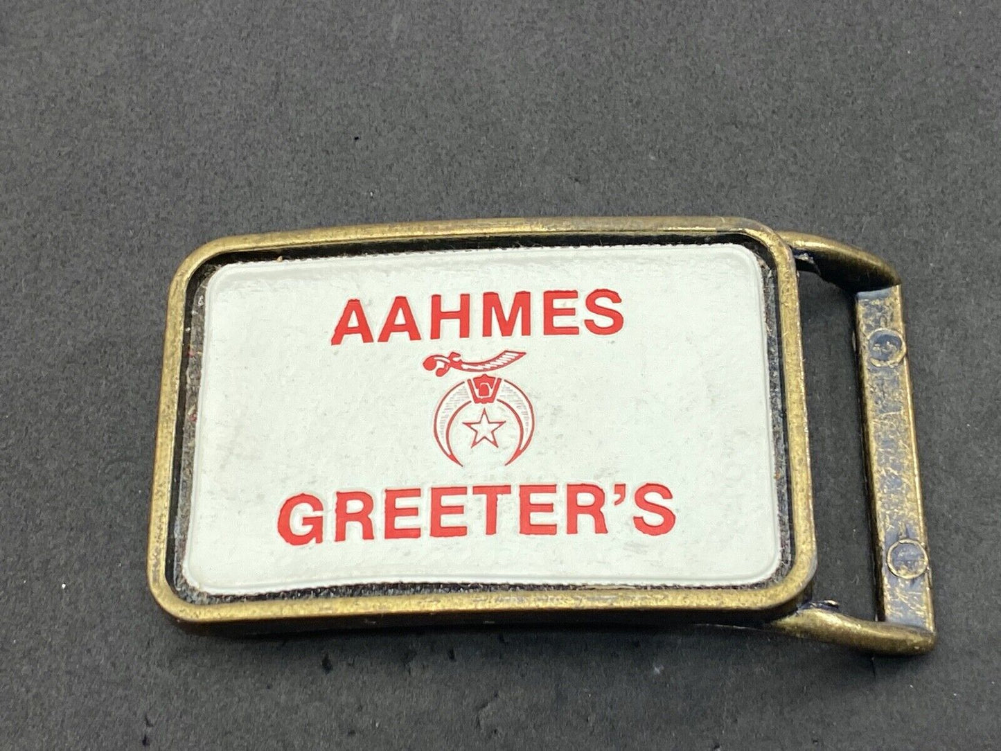 Aahmes Greeters Shriners, or Shrine Masons Club logo - white leather belt buckle