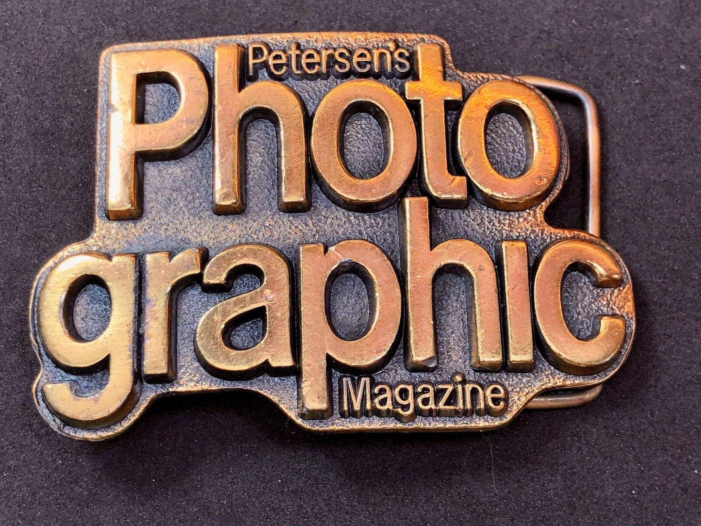 Vintage 1970’s. Petersens PHOTO GRAPHIC Magazine Advertising Logo Belt Buckle 