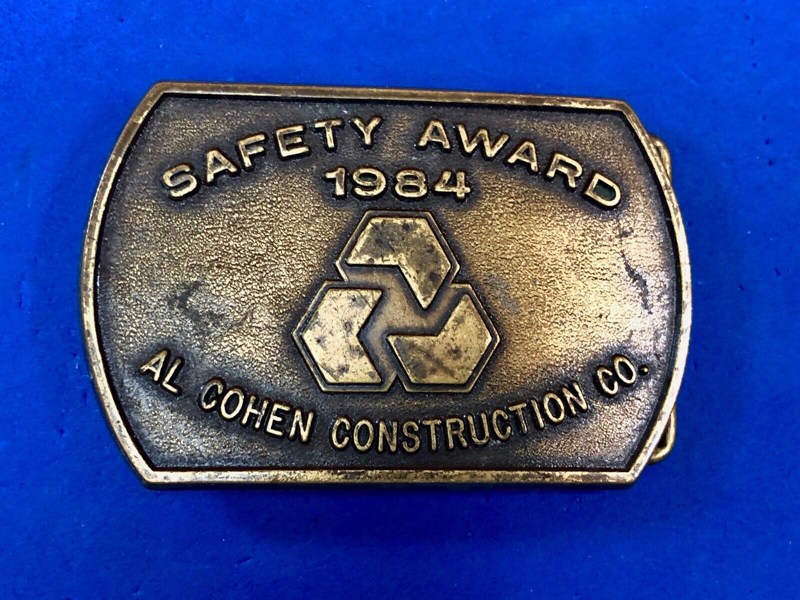 Vintage 1984  AL Cohen Construction Company promotional belt buckle safety award