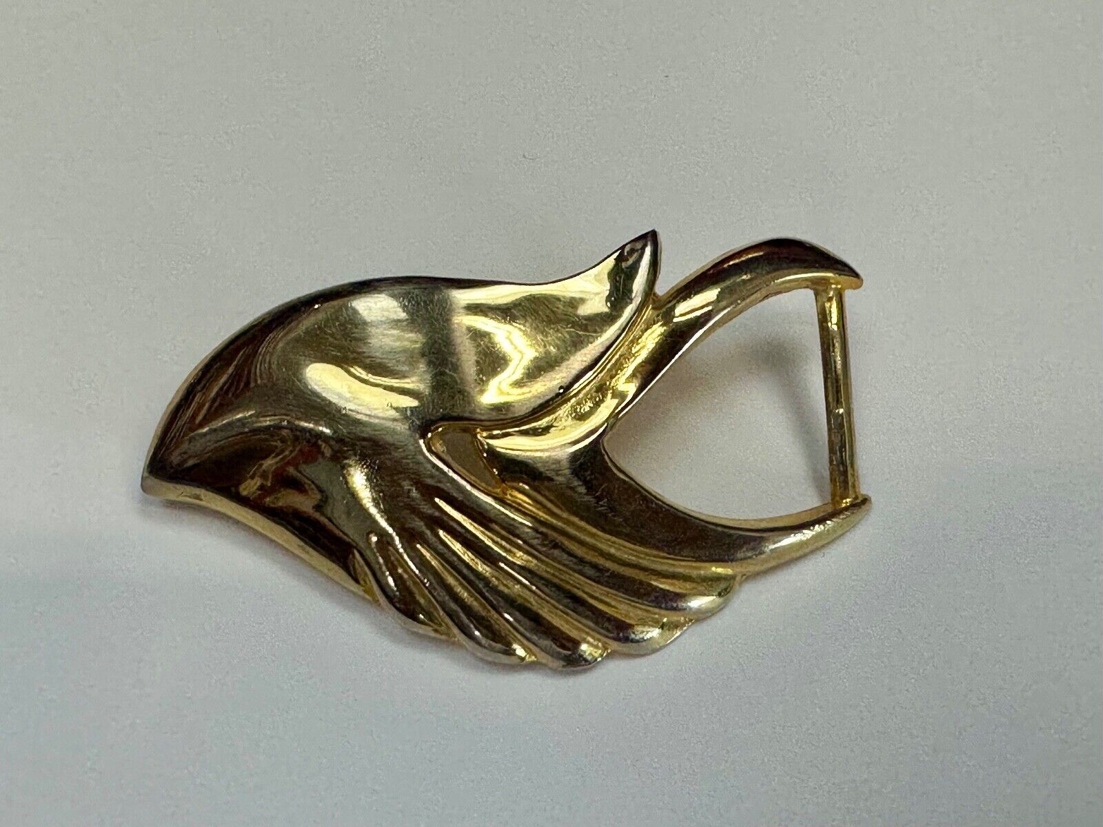 Abstract Art - Wings  gold tone belt buckle signed Leather shop
