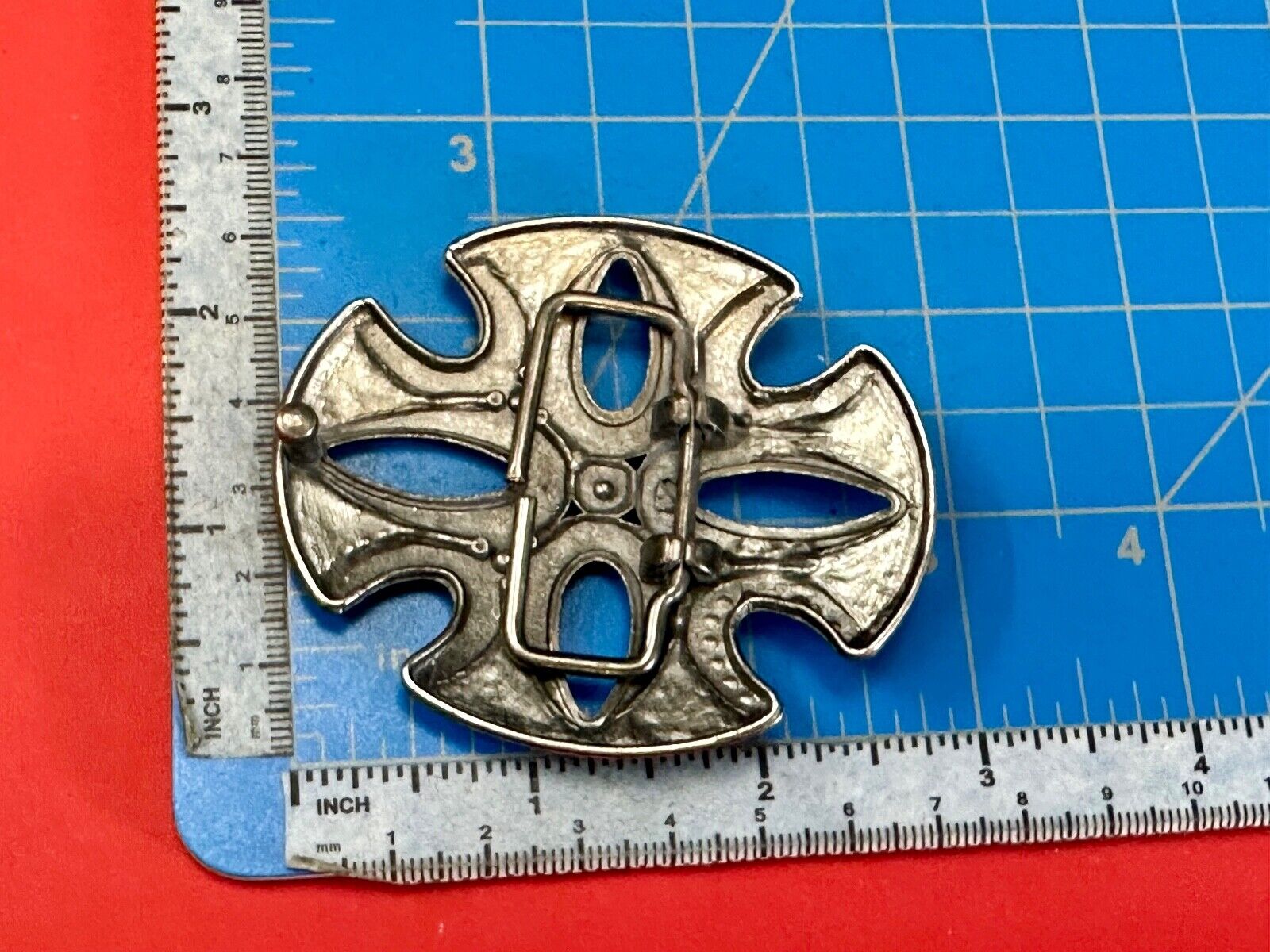 unique see through iron cross with golden brown rhinestone accents