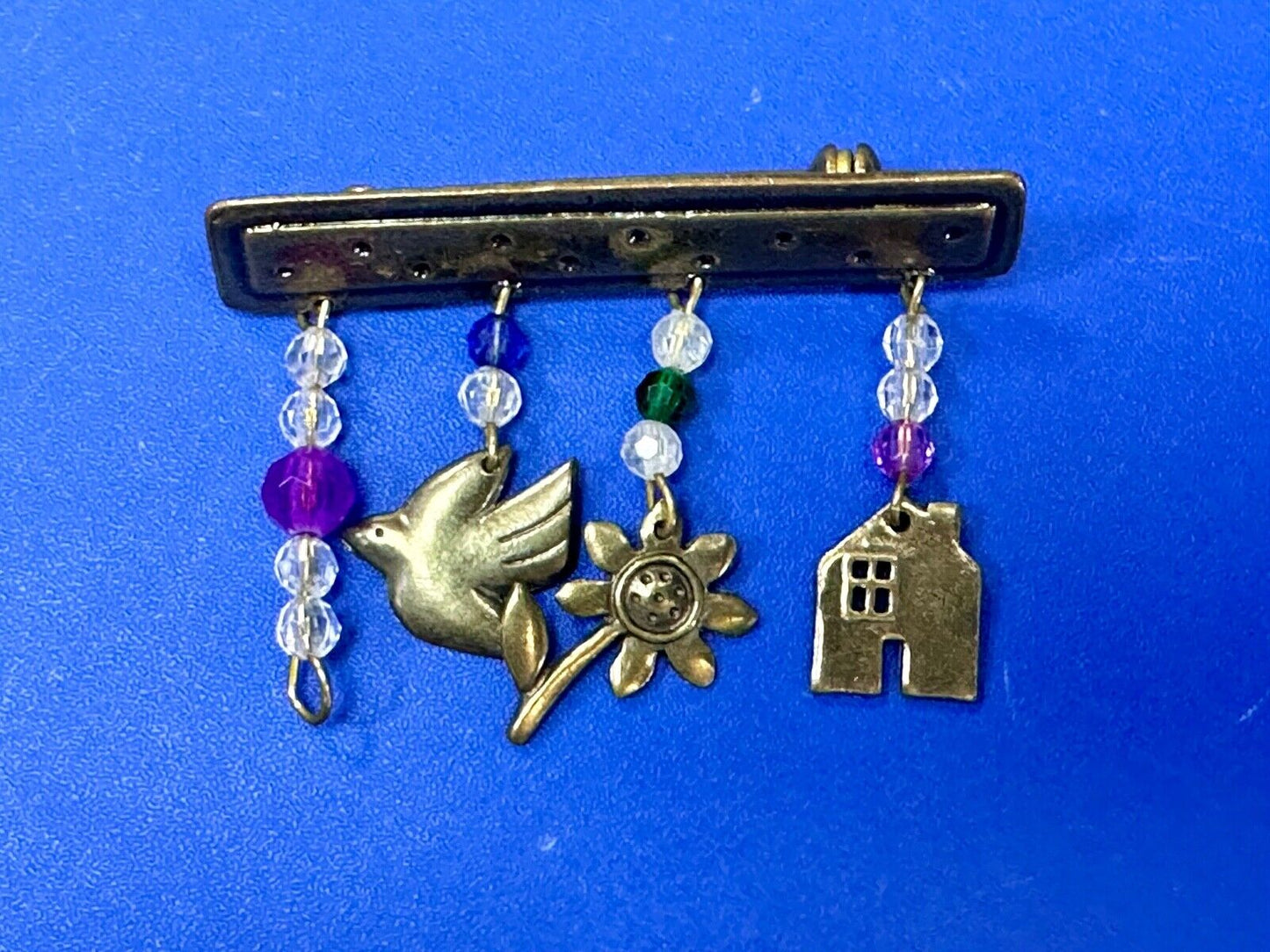 avon signed dangle brooch pin -  Dove stunflower house - missing a charm