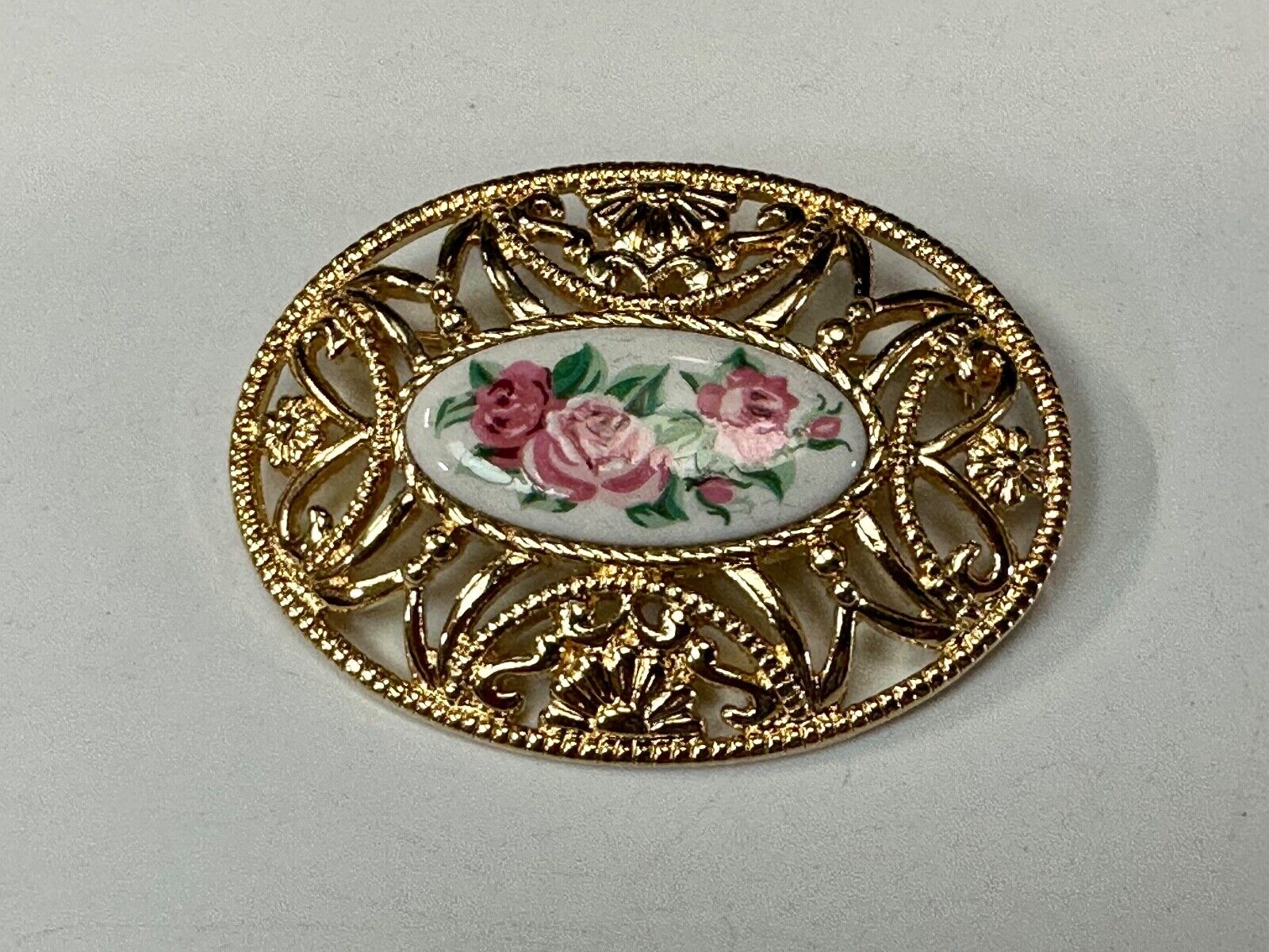 Avon signed gold tone see through surround Porcelain flower theme brooch pin