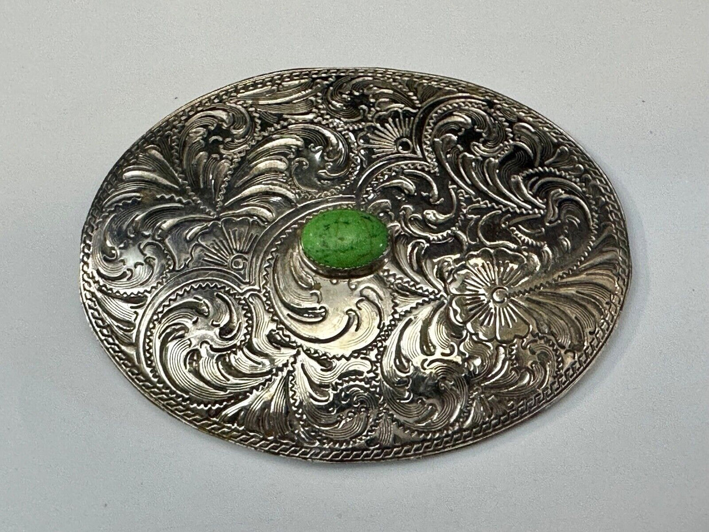 Artisan Made vtg Large western flower swirl design belt buckle  green center Cab
