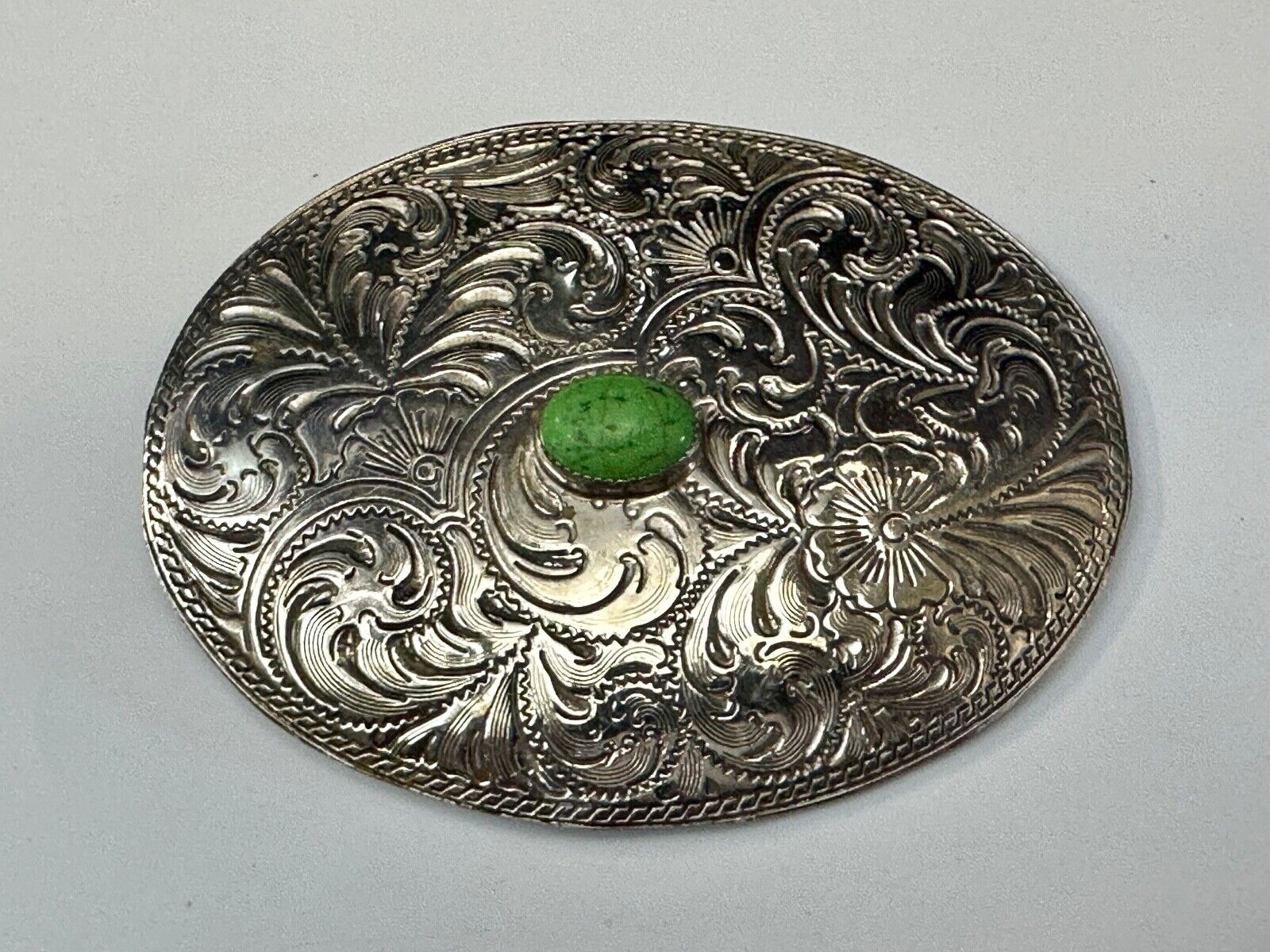 Artisan Made vtg Large western flower swirl design belt buckle  green center Cab
