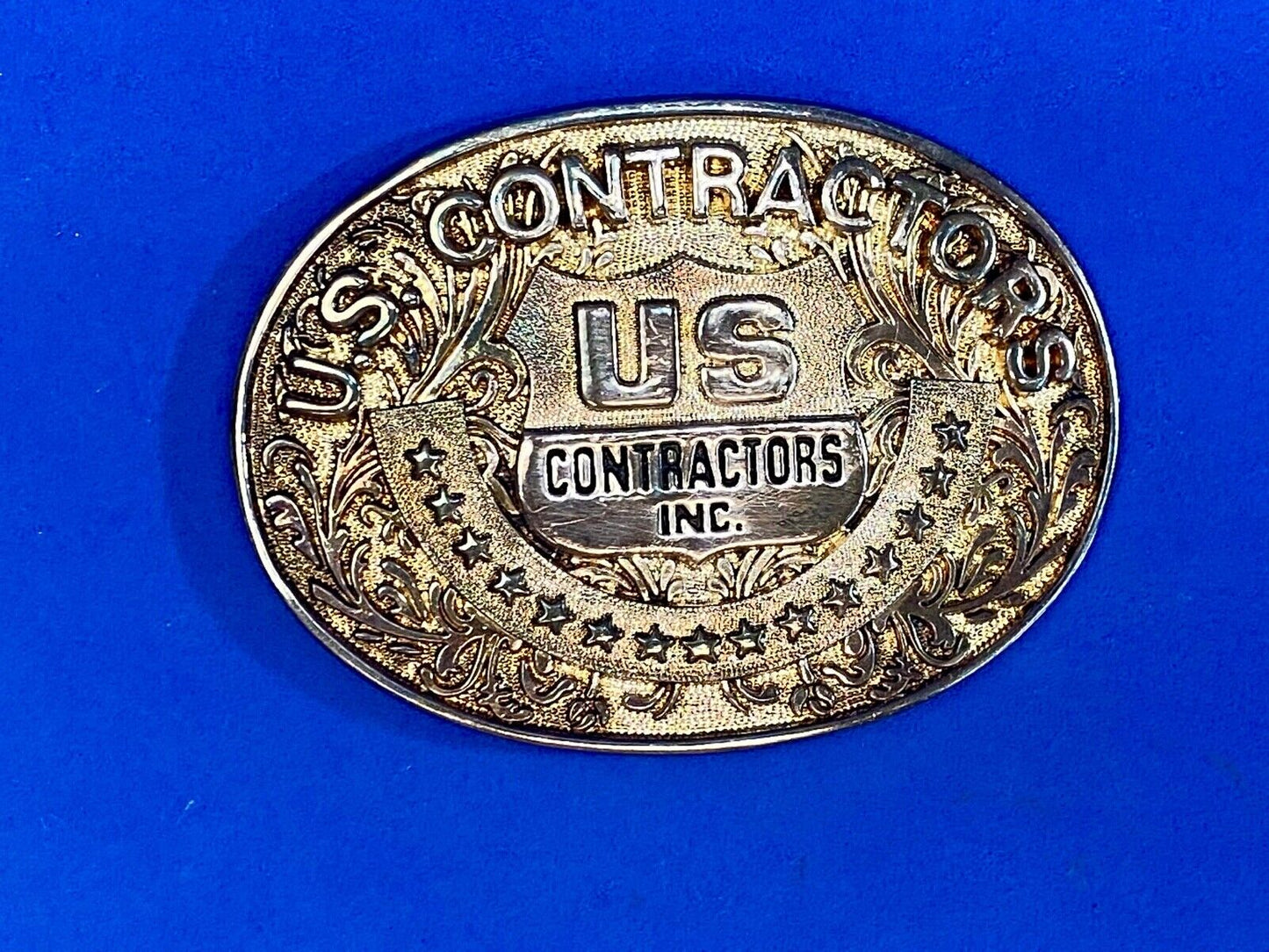 Us Contractors Inc Western Flower Swirl Belt Buckle By O.C. Tanner