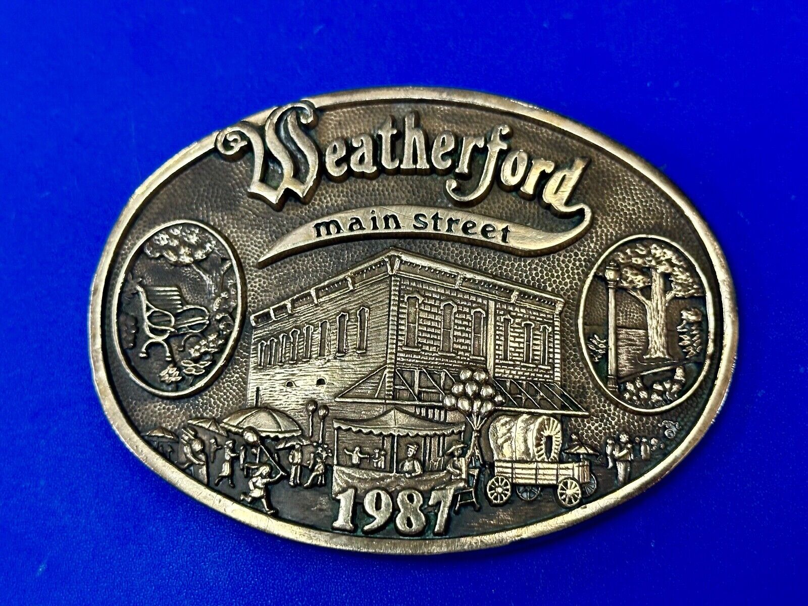 Texas Weatherford Main Street - vintage 1987 LIMITED ADM solid brass belt buckle