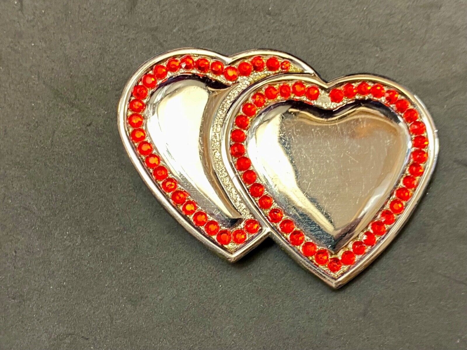 Two Jeweled Hearts Red Rhinestone outlining silver tone cutout belt buckle