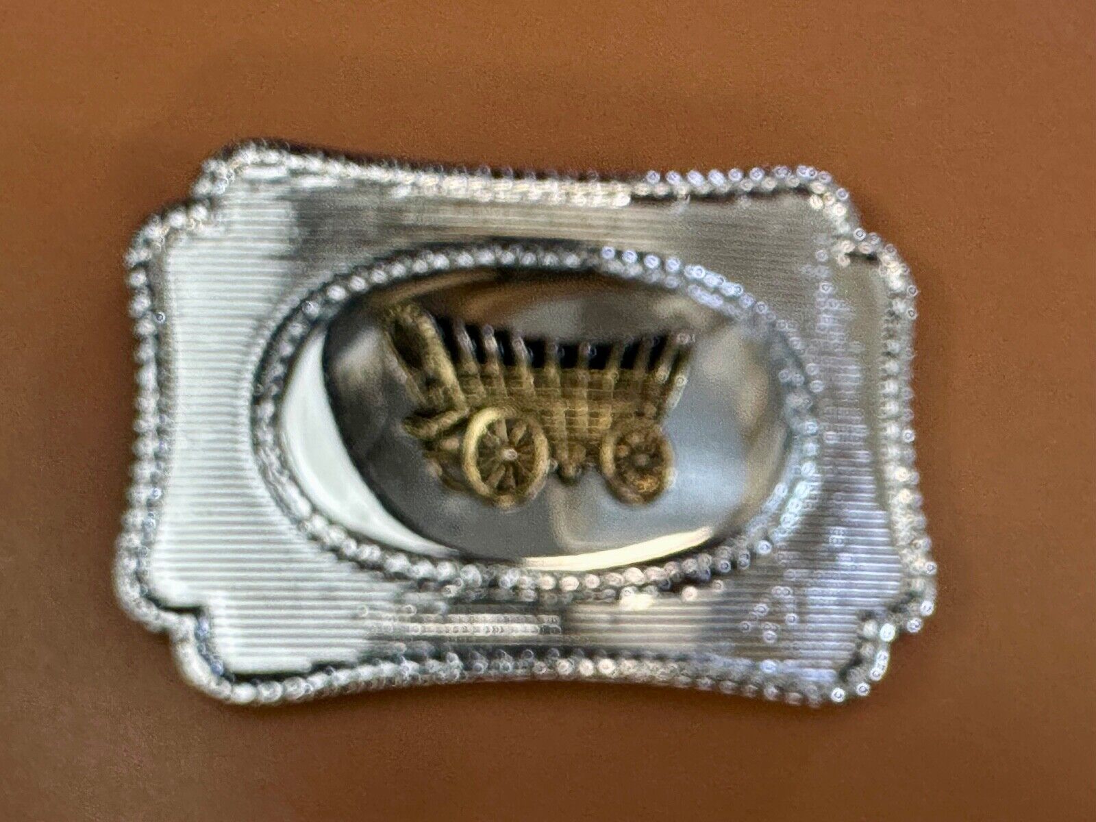 Vintage Covered Wagon - western two tone outlined belt buckle