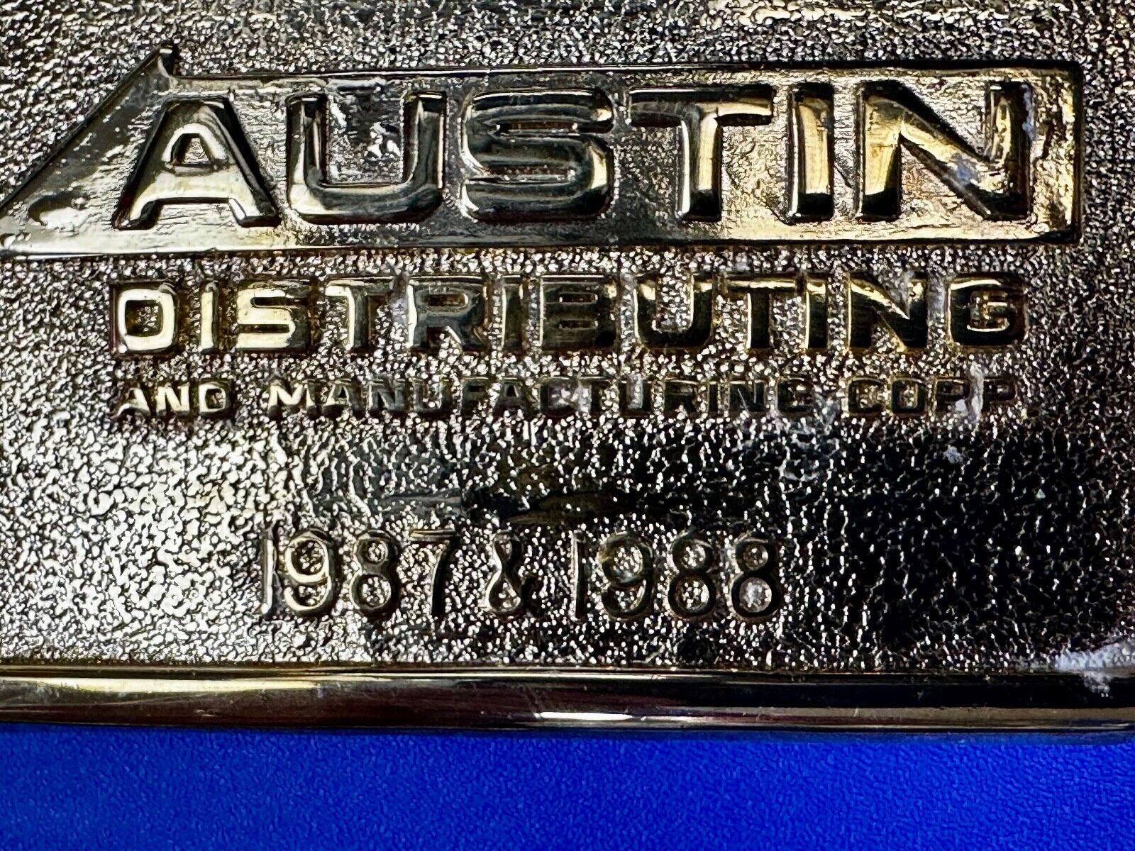 Austin Texas Distributing and Manufacturing 1987 - 1988 Gold Tone Belt Buckle