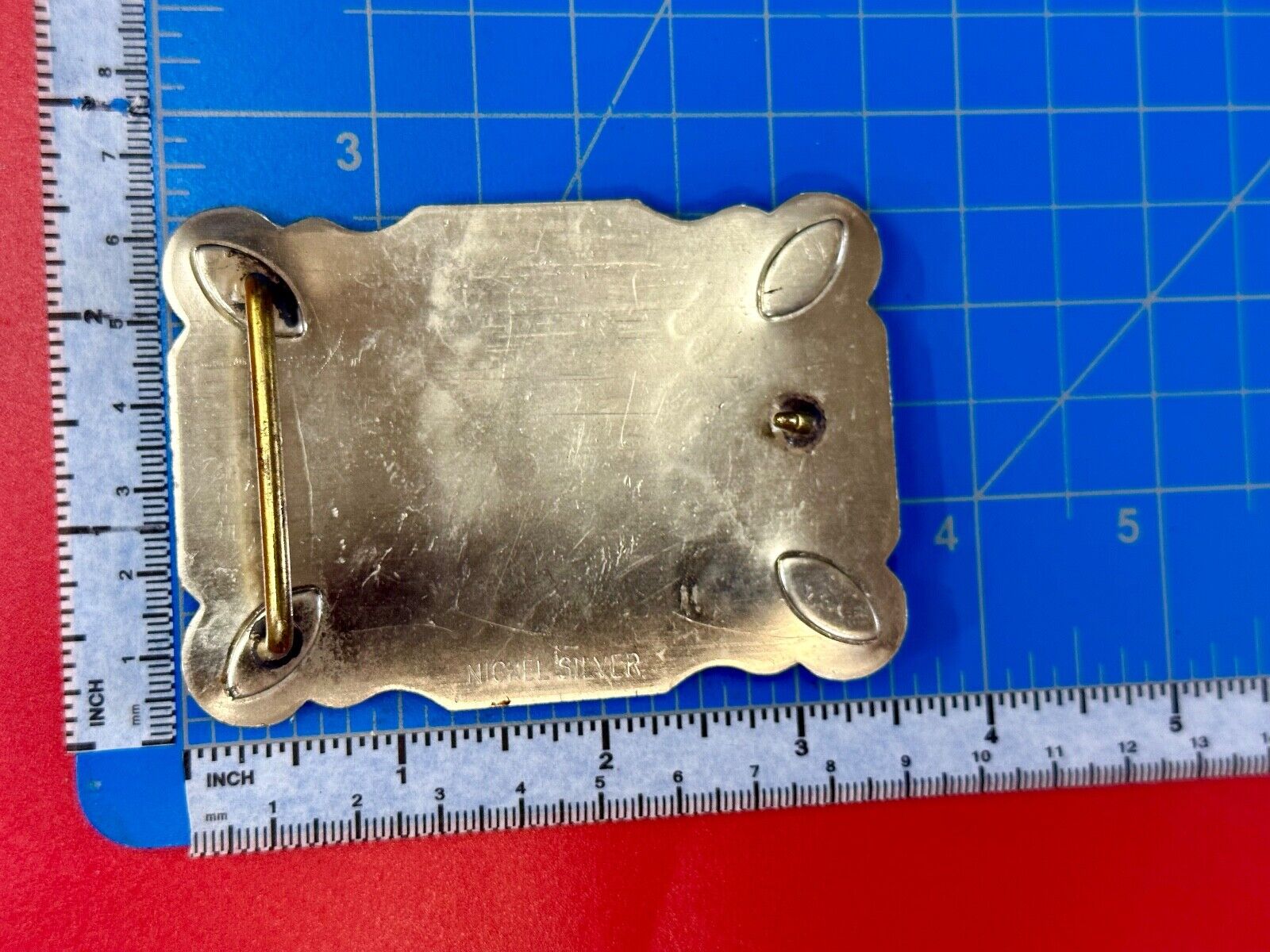 The Longhorn cow steer western nickel silver belt buckle with turquoise accents