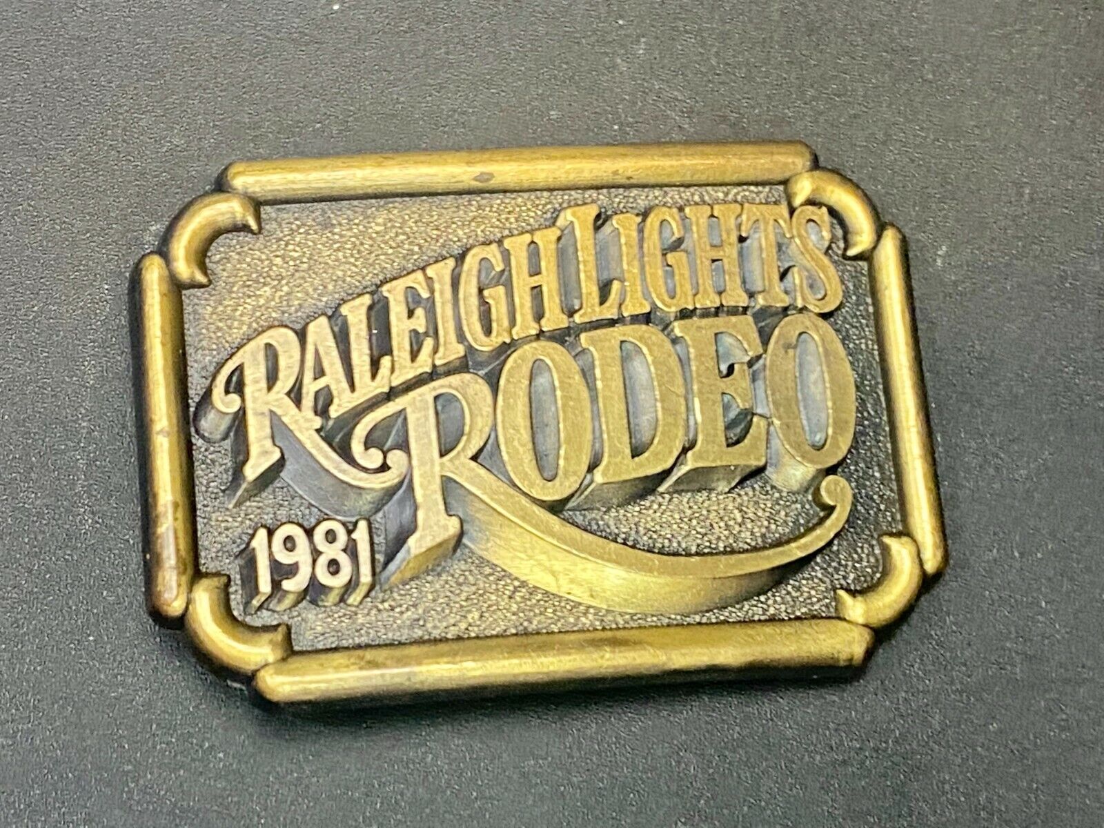 Vintage 1981 Raleigh Lights Rodeo Tobacco Company Advertising Belt Buckle