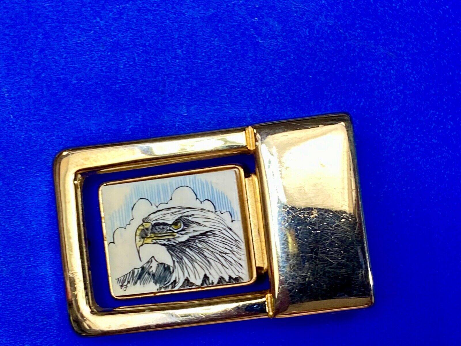 Patriotic American bald Eagle head on small brass or gold color belt buckle