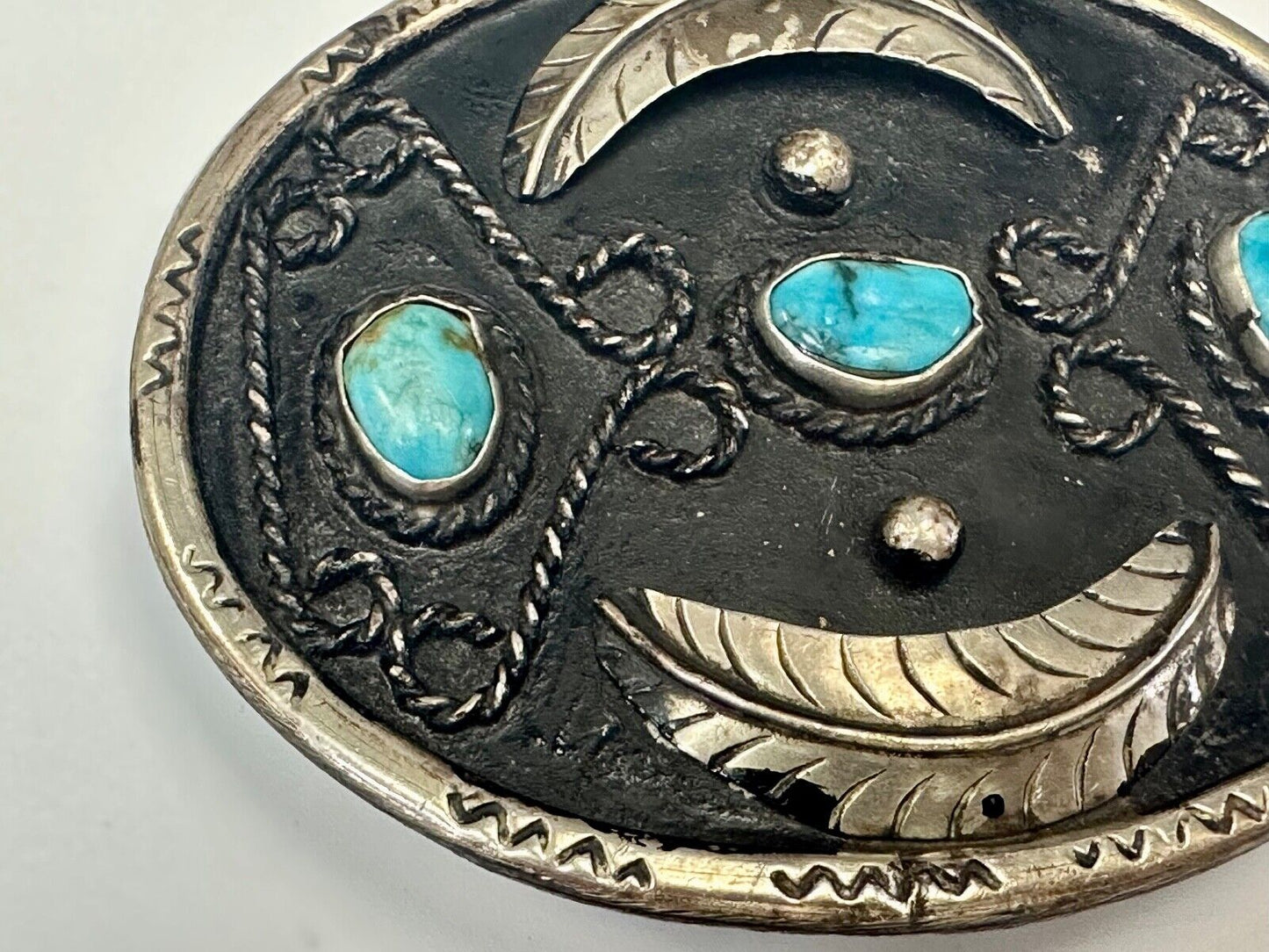 Turquoise stones raised feathers vintage belt buckle marked Sterling 0925 Mexico