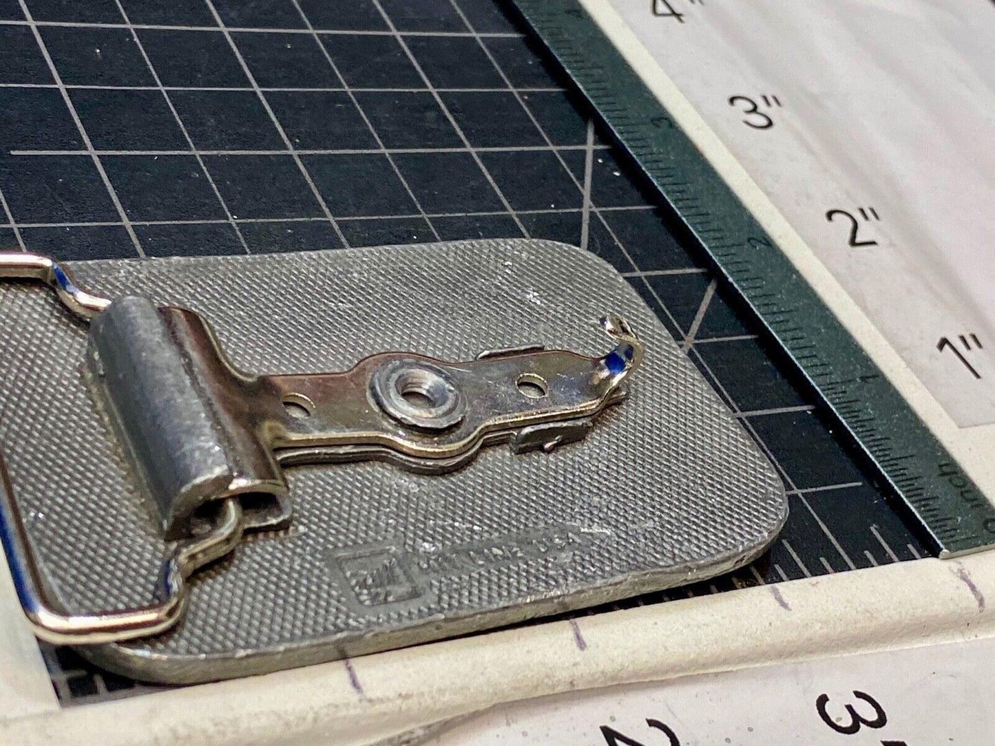 unknown to me, vintage metal belt buckle by HitLine INC.   Company Logo?