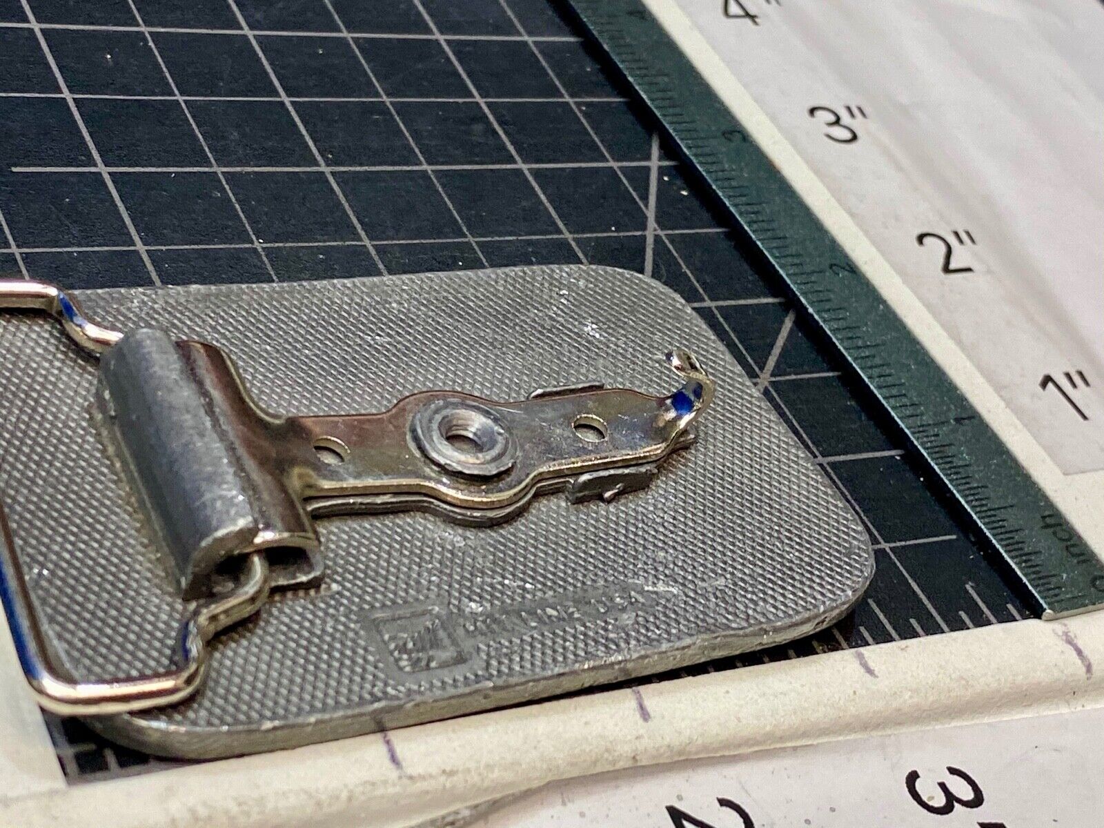 unknown to me, vintage metal belt buckle by HitLine INC.   Company Logo?