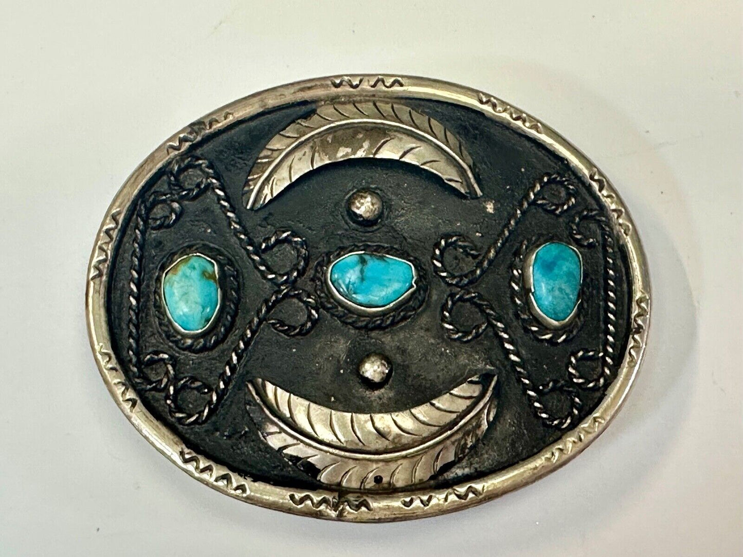 Turquoise stones raised feathers vintage belt buckle marked Sterling 0925 Mexico