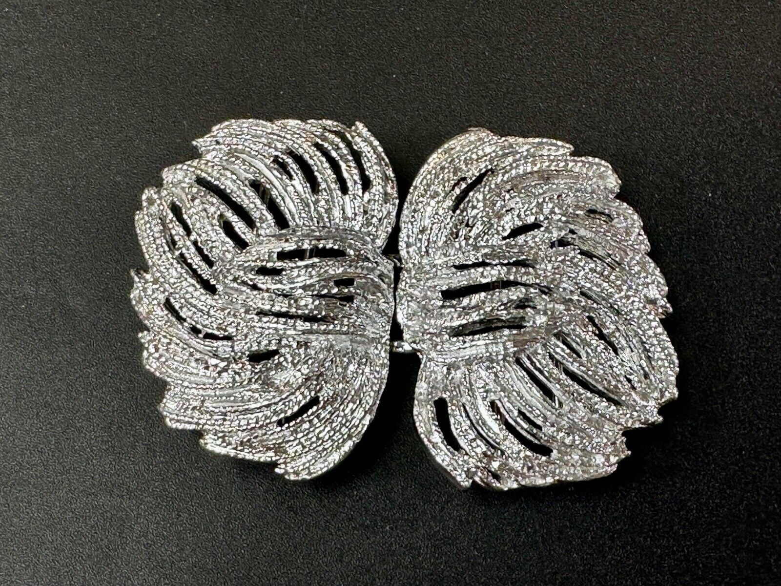 Two piece interlocking sea leaf brushed pattern see through pattern belt buckle