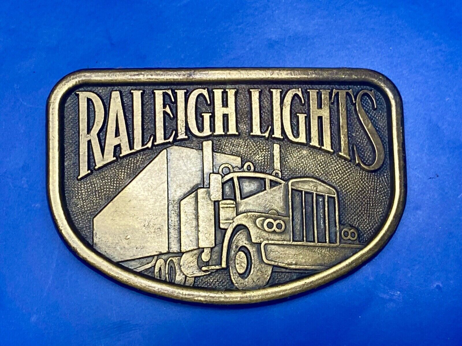 1970s Vintage Raleigh Lights Semi Truck Trucker Brass Tone Belt Buckle by RJ