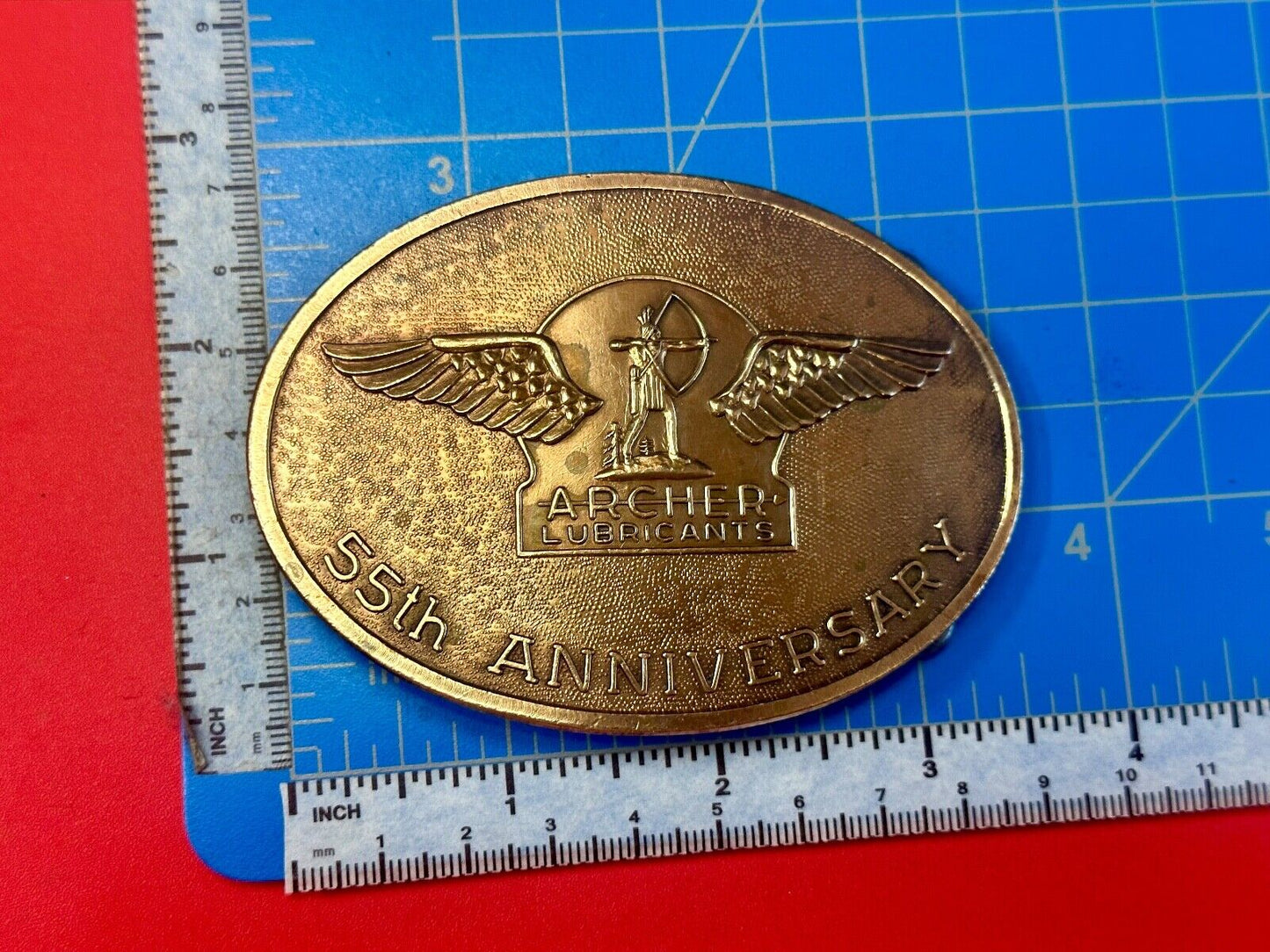Archer Lubricants Omaha NE - Oil for farmers ranchers belt buckle