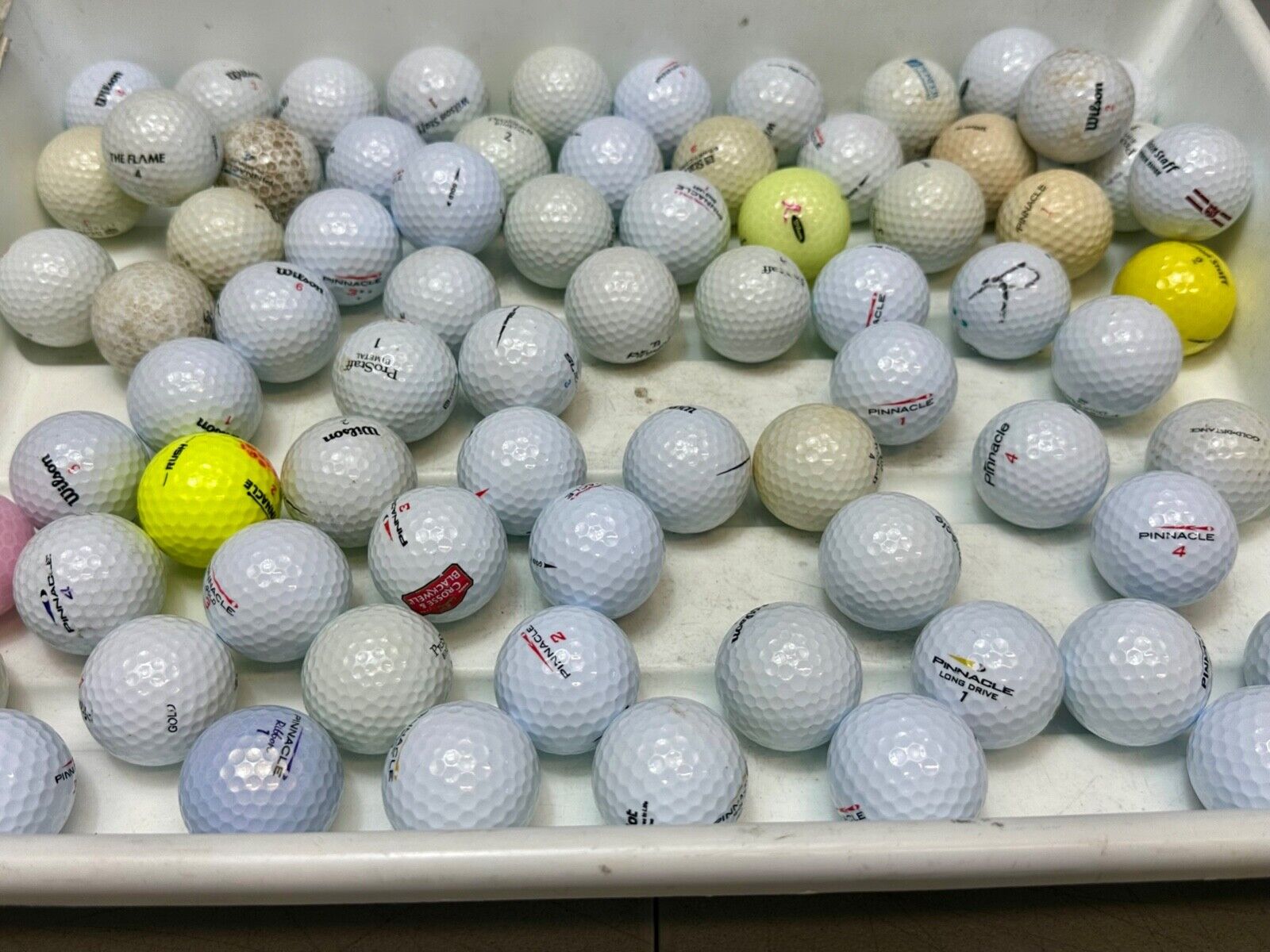 73 pc Used Golf Ball Lot. - Mostly Wilson Pinnacle