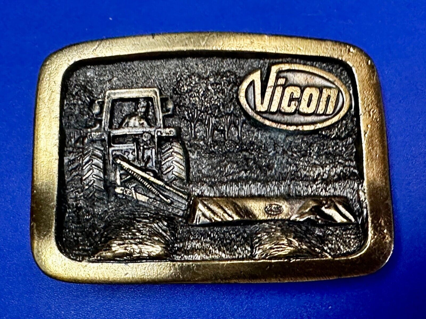 Vicon Disk Mower Tractor Promotional Belt Buckle by Premium Specialties