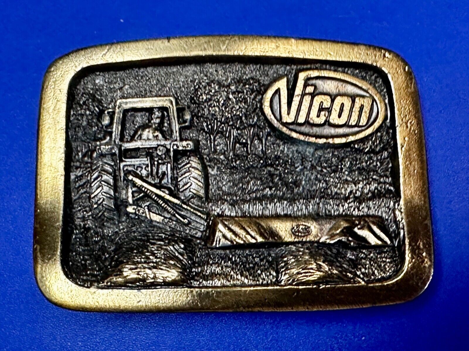 Vicon Disk Mower Tractor Promotional Belt Buckle by Premium Specialties