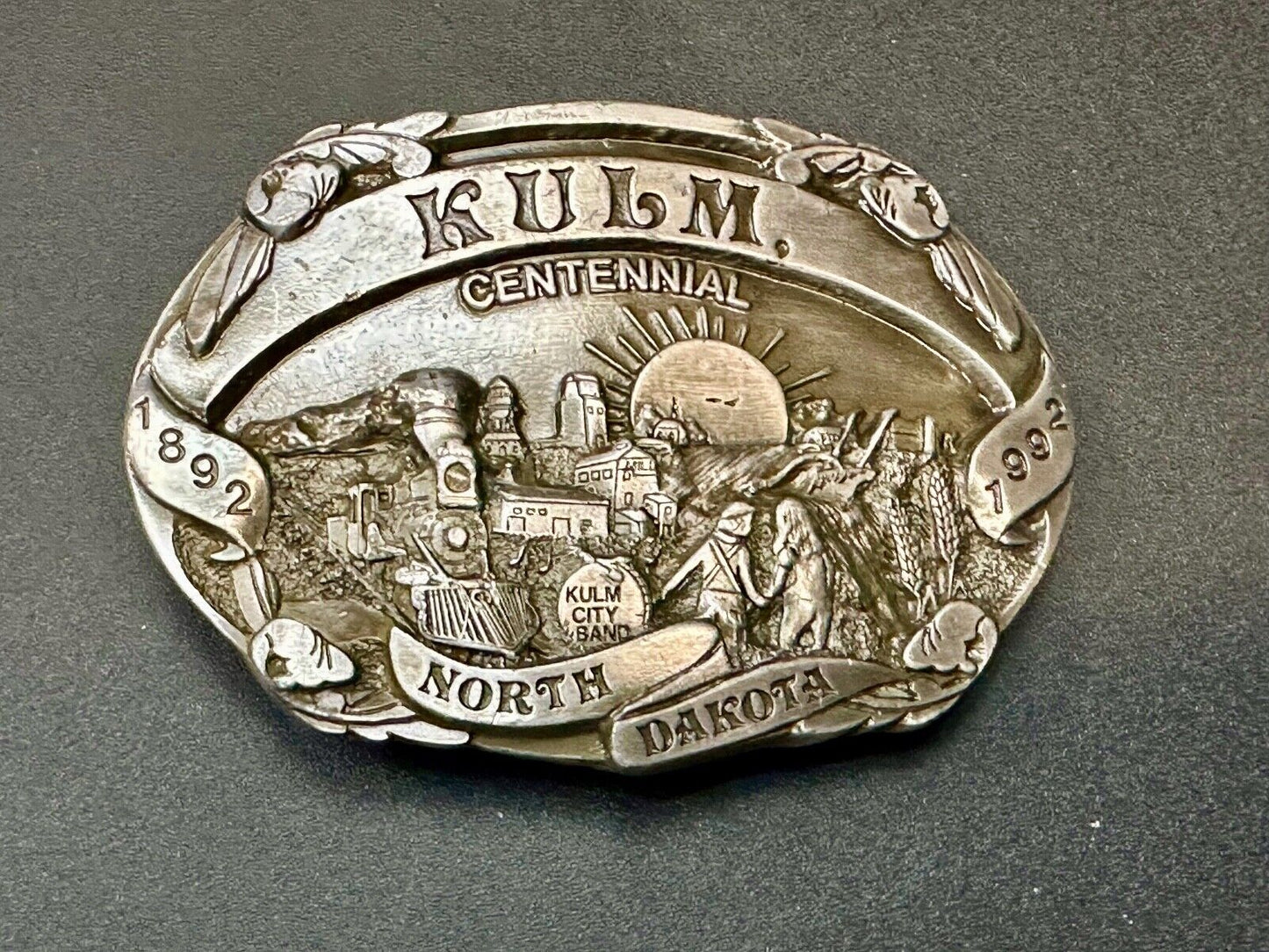 Vintage KULM North Dakota commemorative belt buckle by DART inc.