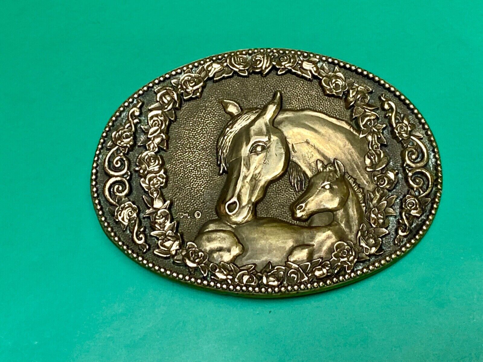 Two horse heads First addition brass belt buckle by Award Design Medals