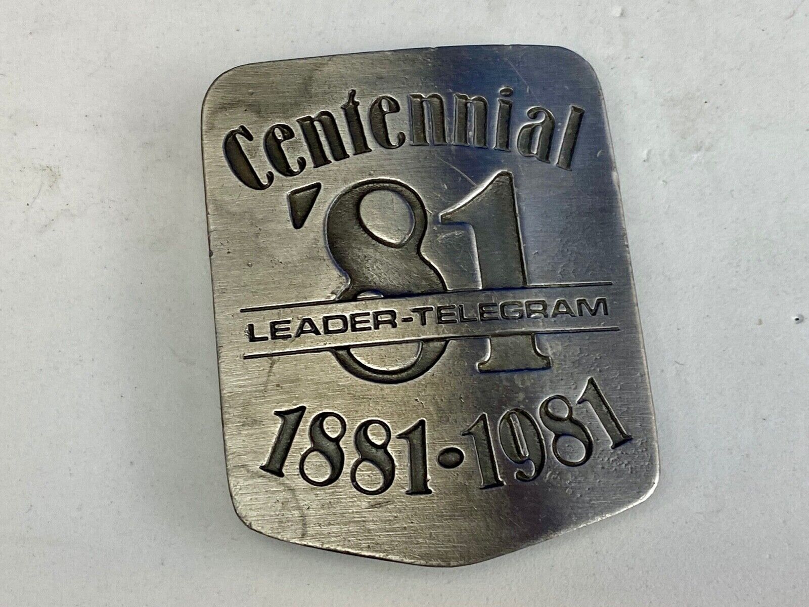 Vintage 1981 LEADER TELEGRAM BELT BUCKLE NEWSPAPER EAU CLAIRE & WEST CENTRAL WI
