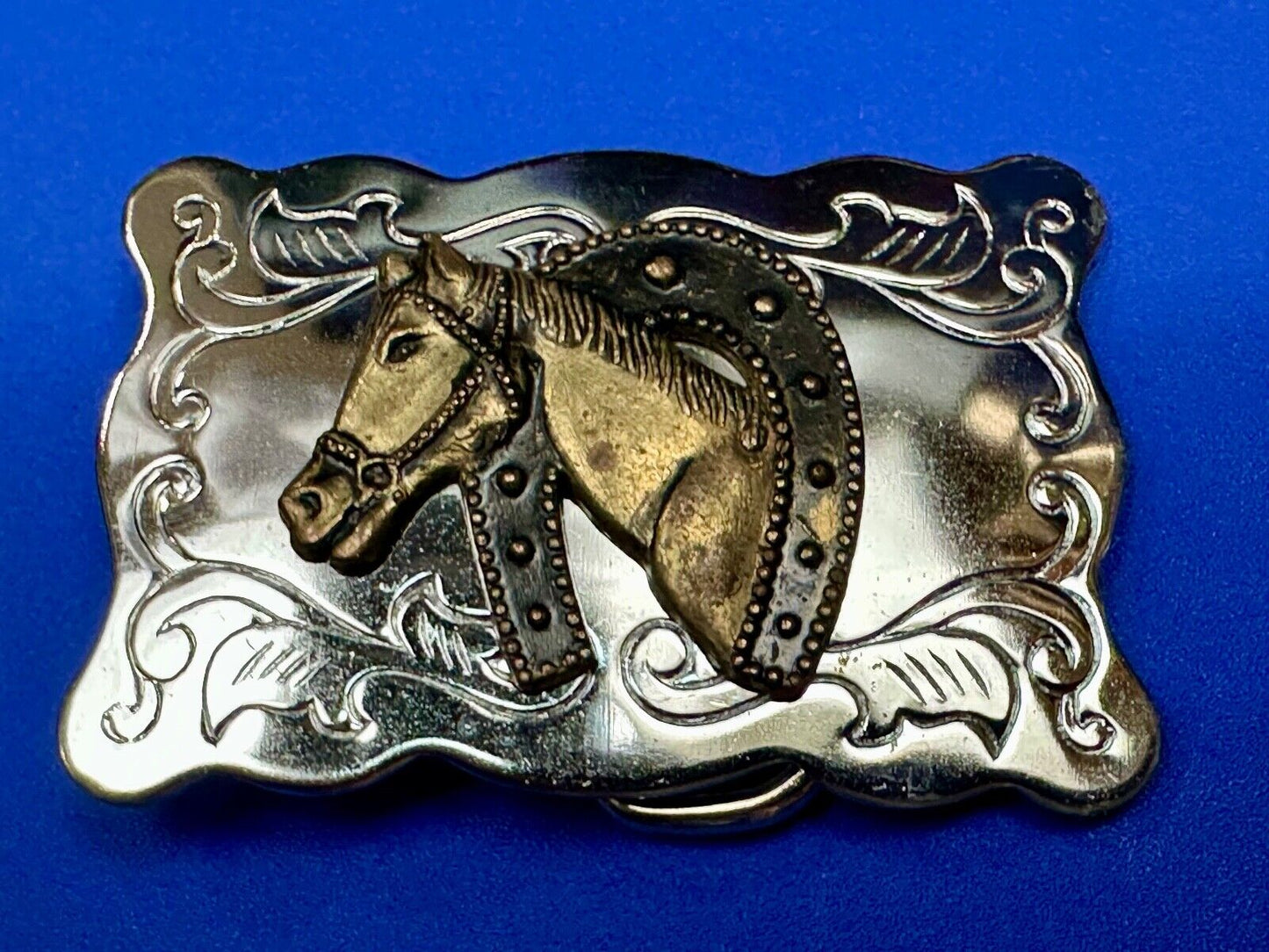 Vintage lucky horseshoe with head centerpiece on western two tone belt buckle