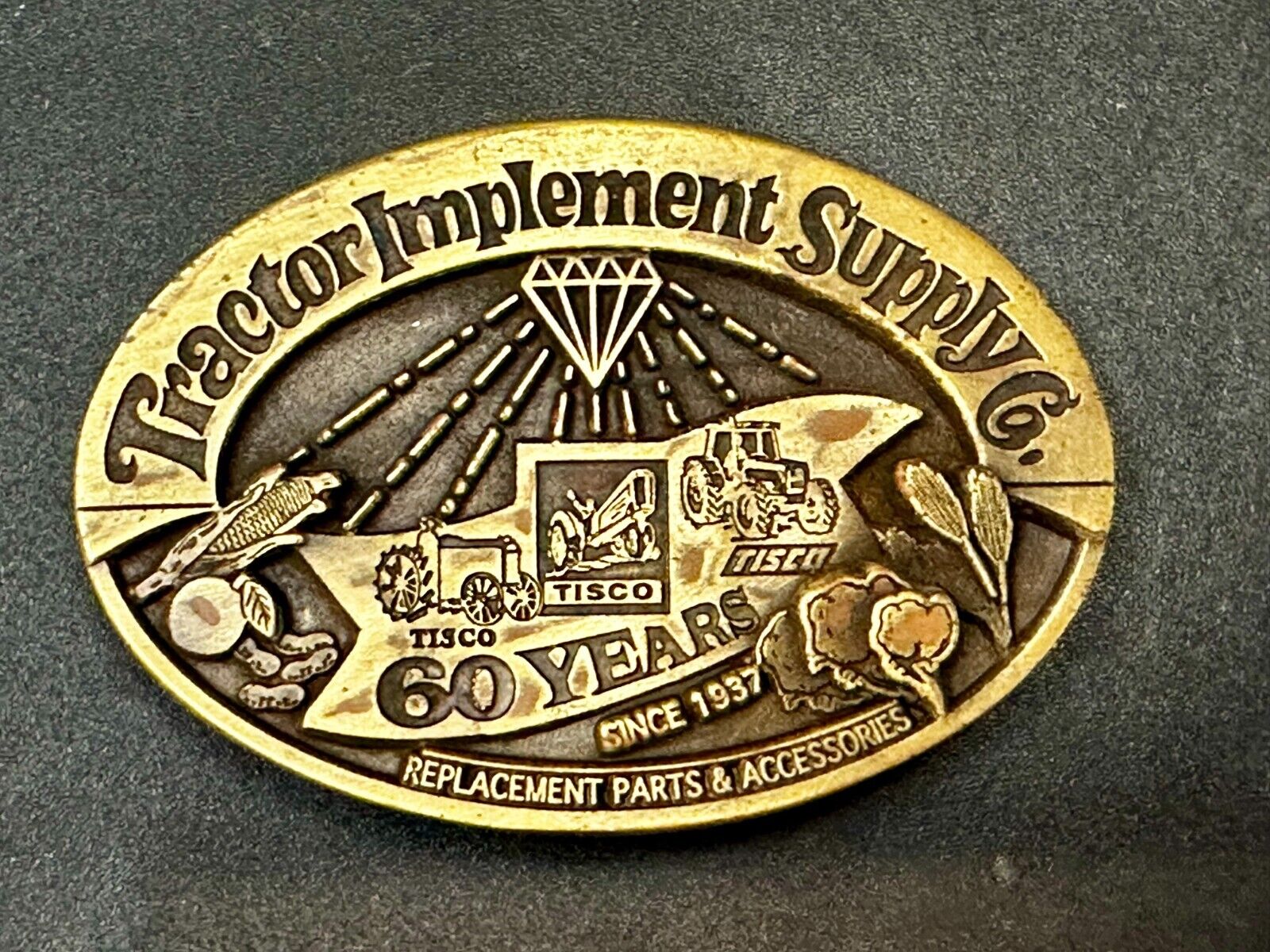 60 Years TISCO Tractor Implement Supply company NOS Belt Buckle by Speccast