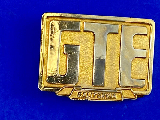 Vintage GTE telecommunications California logo gold color belt buckle 